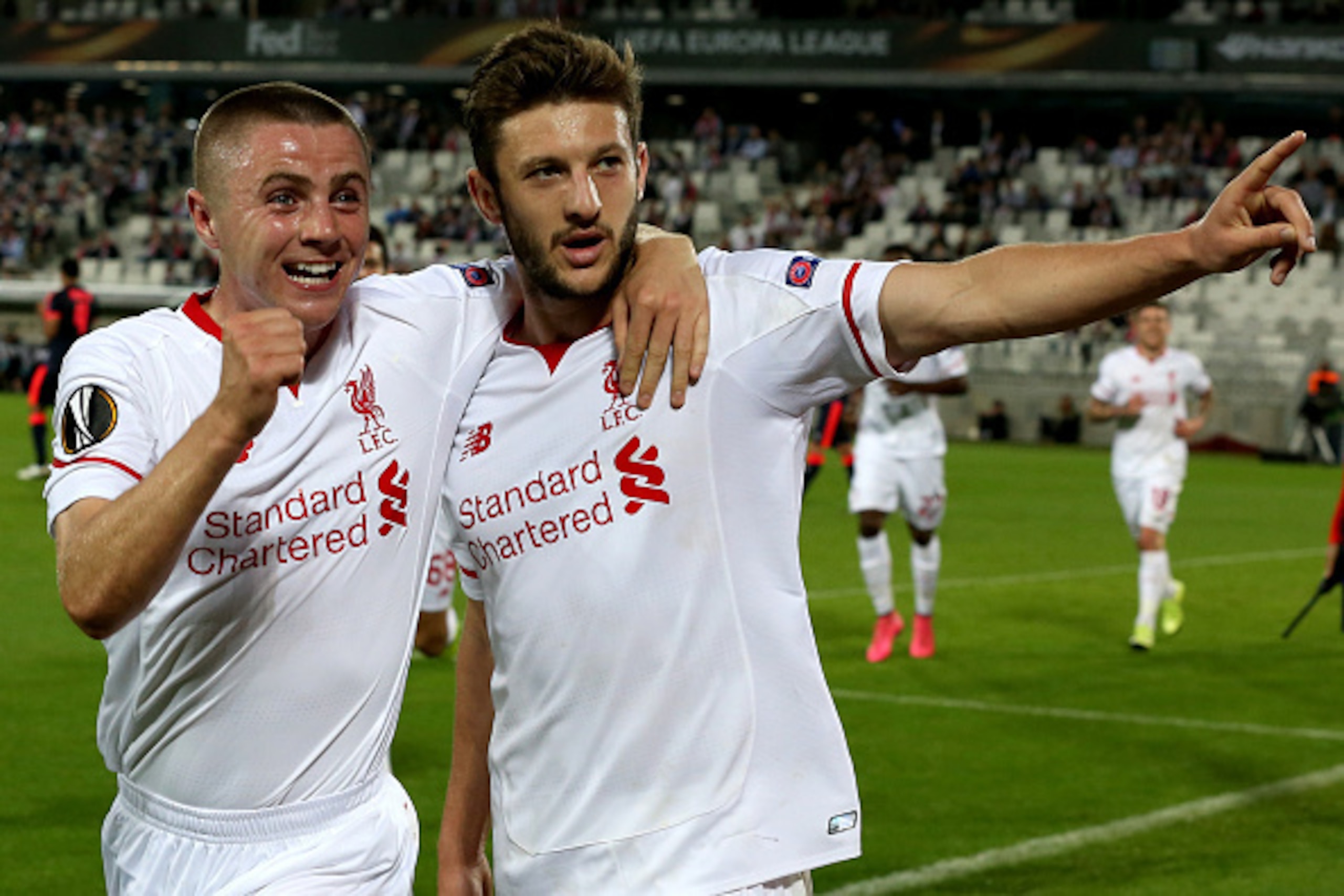 BORDEAUX, FRANCE - SEPTEMBER 17: Jordan Rossiter (L) and Adam Lallana after his goal for Liverpool FC during the Europa League game between FC Girondins de Bordeaux and Liverpool FC at Matmut Atlantique Stadium on September 17, 2015 in Bordeaux, France.  