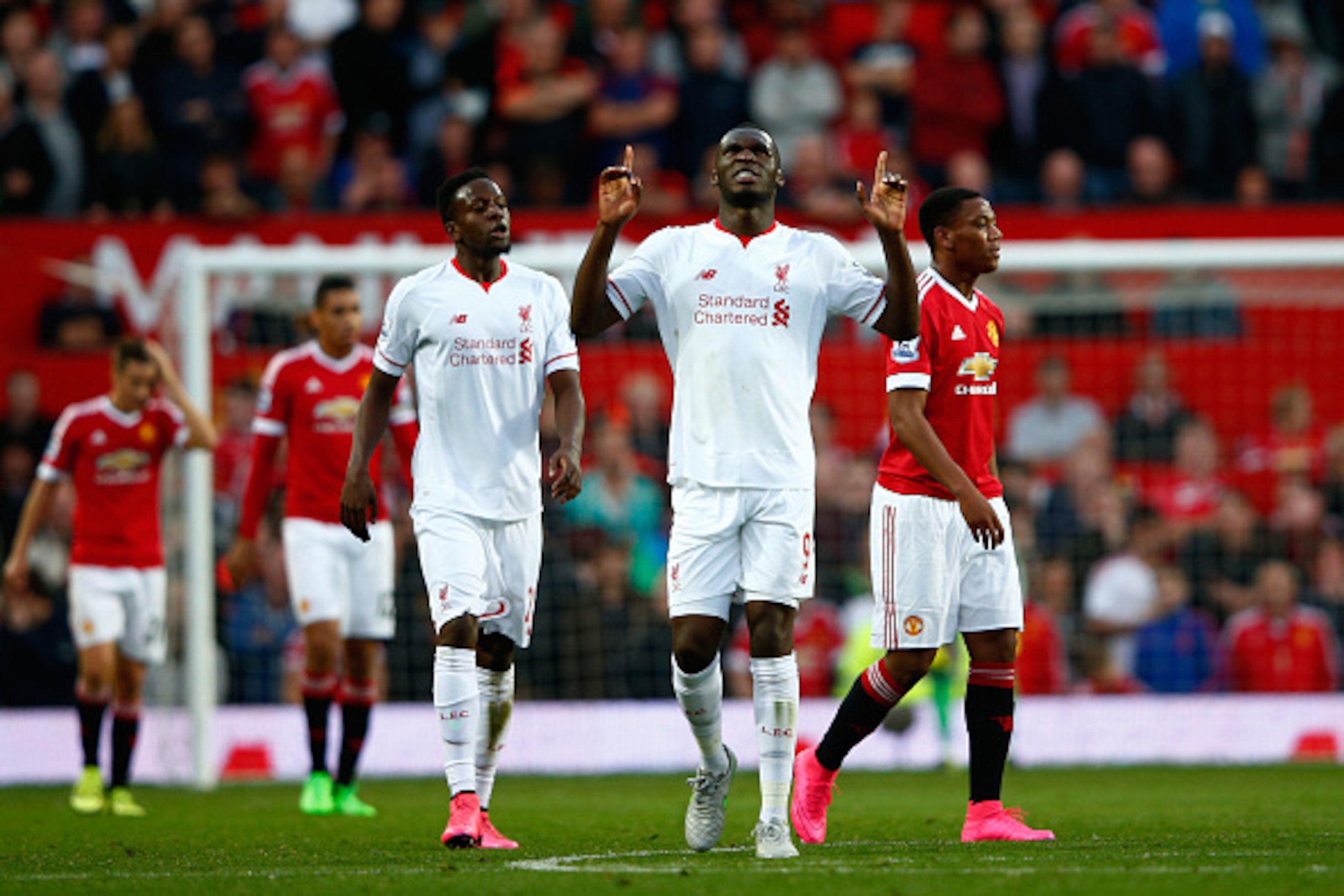 MANCHESTER, ENGLAND - SEPTEMBER 12: Christian Benteke of Liverpool celebrates scoring his goal during the Barclays Premier League match between Manchester United and Liverpool at Old Trafford on September 12, 2015 in Manchester, United Kingdom.  (Photo by