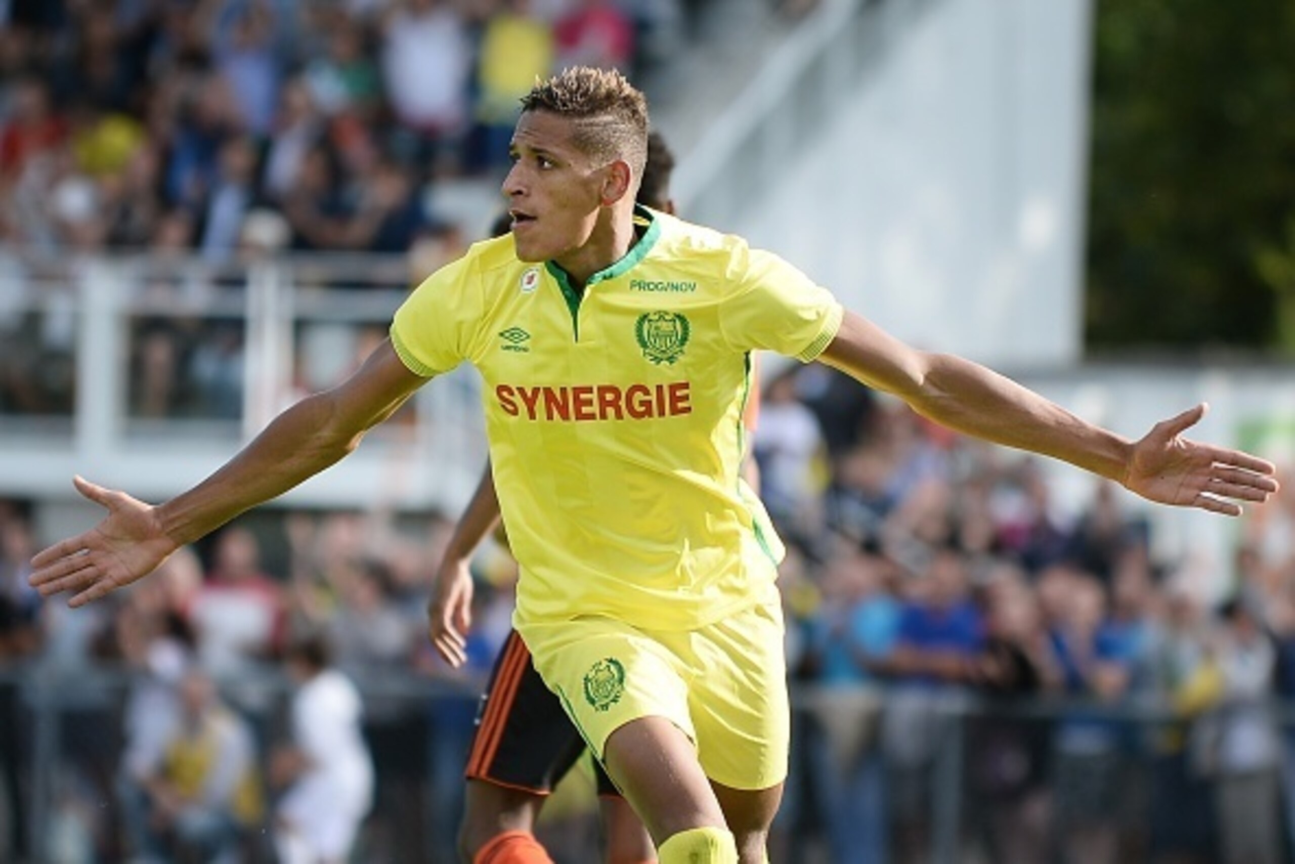 Nantes' French forward Yacine Bammou celebrates after scoring a goal during the friendly football match between Nantes (FCN) and Lorient (FCL) on July 22, 2015 at the Moreau-Desfarges stadium in La Baule-Escoublac, western France. AFP PHOTO / JEAN-SEBASTI