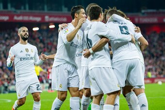 BILBAO, SPAIN - SEPTEMBER 23:  Karim Benzema (R) of Real Madrid CF celebrates after scoring during the La Liga match between Athletic Club Bilbao and Real Madrid CF at San Mames Stadium on September 23, 2015 in Bilbao, Spain.  (Photo by Juan Manuel Serran