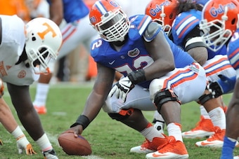 GAINESVILLE, FL - SEPTEMBER 21: Offensive lineman Jonotthan Harrison #72 of the Florida Gators sets for play against the Tennessee Volunteers  September 21, 2013 at Ben Hill Griffin Stadium at Florida Field in Gainesville, Florida.  (Photo by Al Messersch