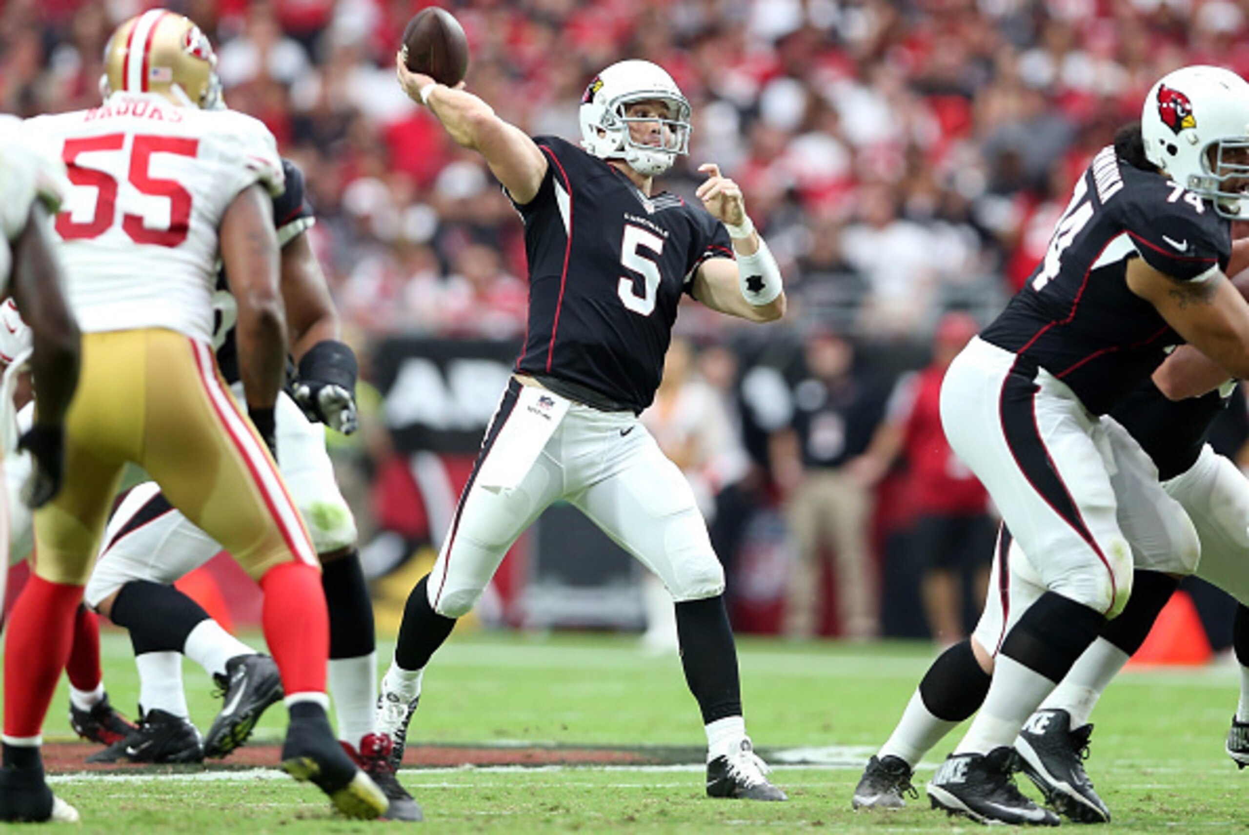 GLENDALE, AZ - SEPTEMBER 21:  Quarterback Drew Stanton #5 of the Arizona Cardinals throws a pass during the NFL game against the San Francisco 49ers at the University of Phoenix Stadium on September 21, 2014 in Glendale, Arizona.  The Cardinals defeated t