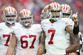 GLENDALE, AZ - SEPTEMBER 21:  Quarterback Colin Kaepernick #7 of the San Francisco 49ers during the NFL game against the Arizona Cardinals at the University of Phoenix Stadium on September 21, 2014 in Glendale, Arizona. The Cardinals defeated the 49ers 23