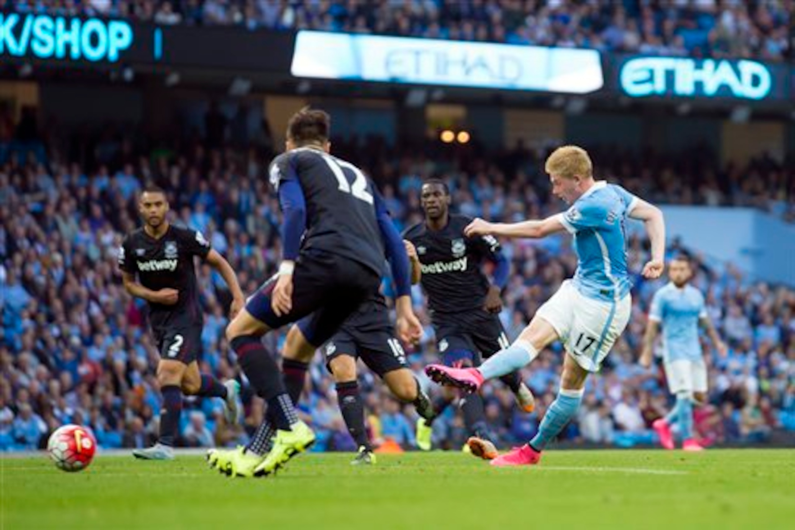 Kevin De Bruyne fires at the West Ham United goal during an impressive home league debut.