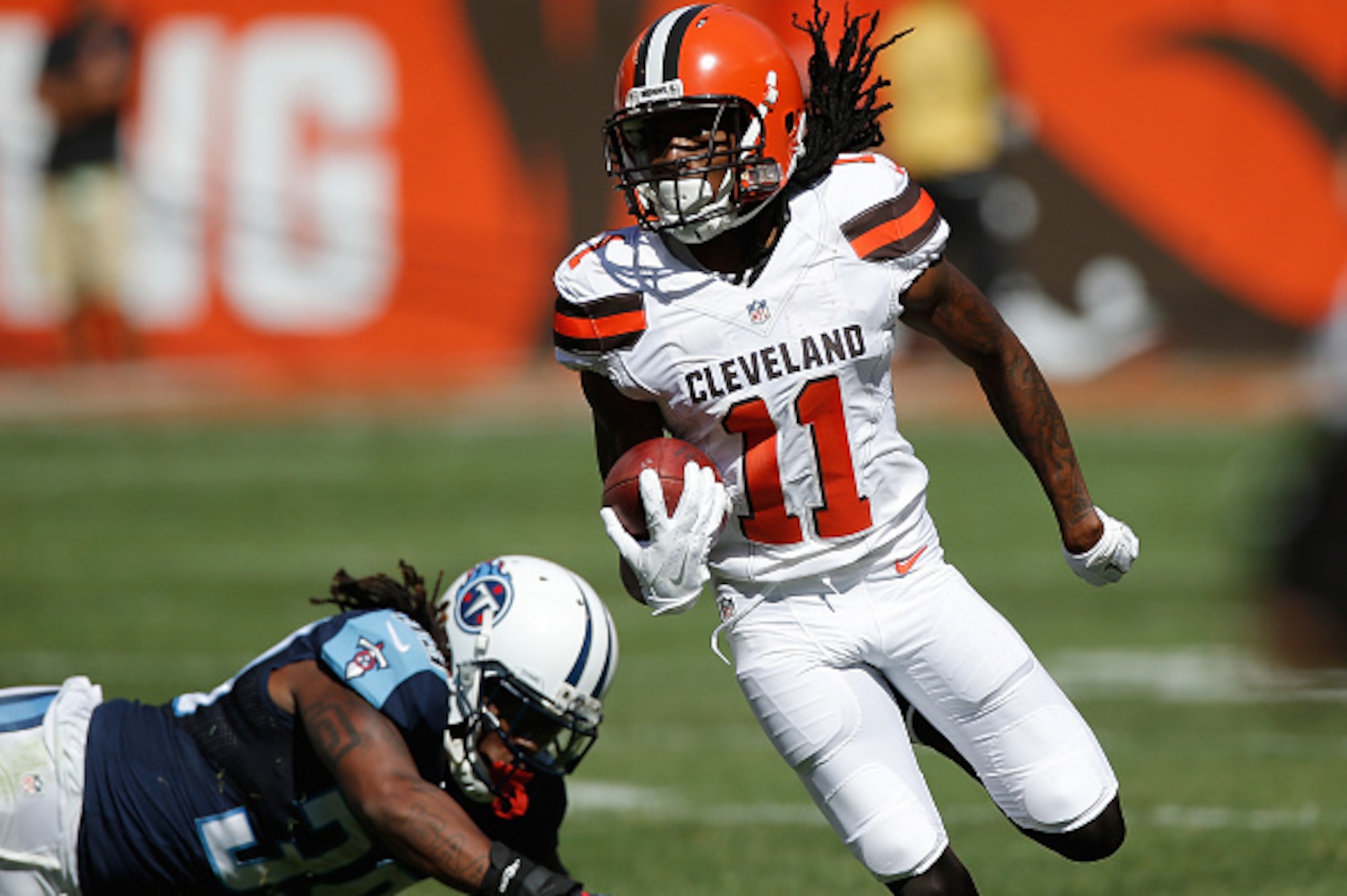 CLEVELAND, OH - SEPTEMBER 20: Travis Benjamin #11 of the Cleveland Browns returns a second quarter punt for a touchdown while playing the Tennessee Titans at FirstEnergy Stadium on September 20, 2015 in Cleveland, Ohio.  (Photo by Gregory Shamus/Getty Ima