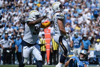 SAN DIEGO, CA - SEPTEMBER 13:  Linebacker Kyle Emanuel #51 of the San Diego Chargers celebrates after sacking quarterback Matthew Stafford #9 of the Detroit Lions at Qualcomm Stadium on September 13, 2015 in San Diego, California.  (Photo by Donald Mirall
