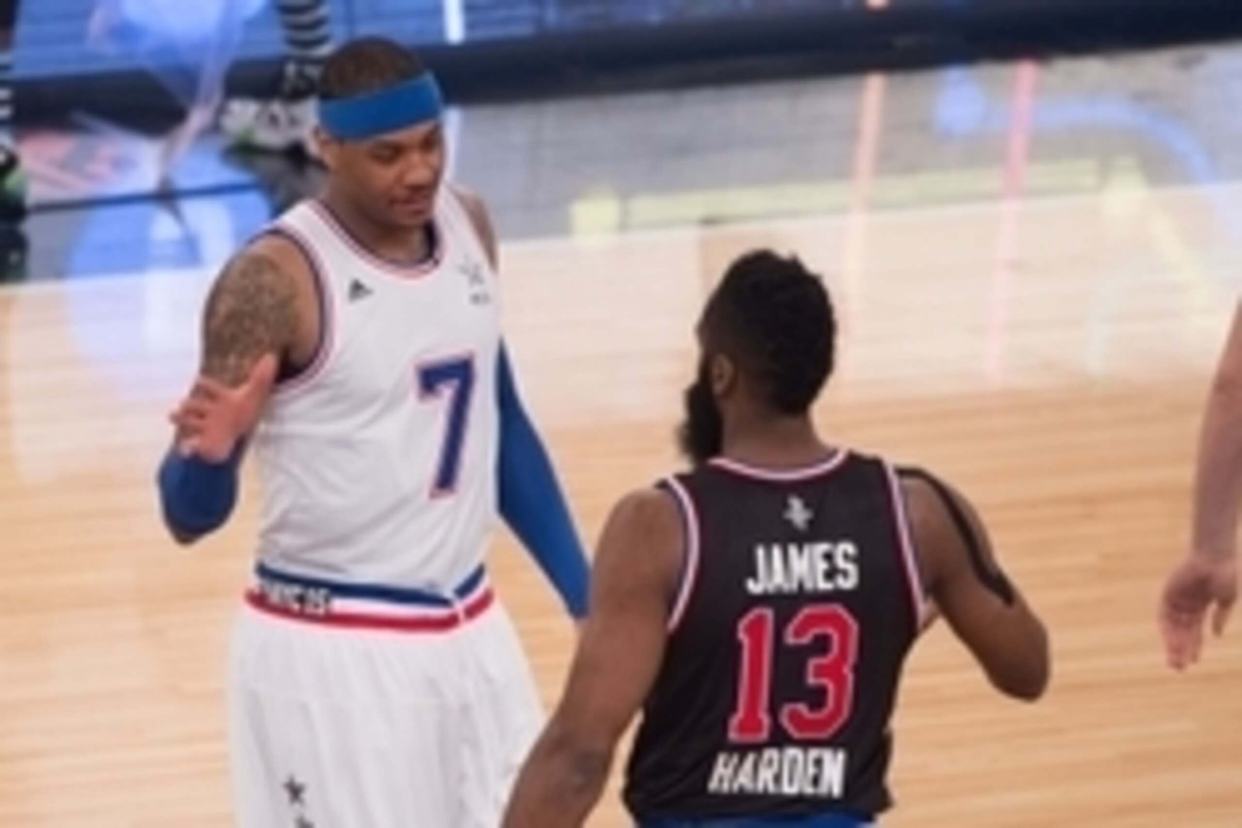 February 15, 2015; New York, NY, USA; Eastern Conference forward Carmelo Anthony of the New York Knicks (7) shakes hands with Western Conference guard James Harden of the Houston Rockets (13) before the 2015 NBA All-Star Game at Madison Square Garden.Mand