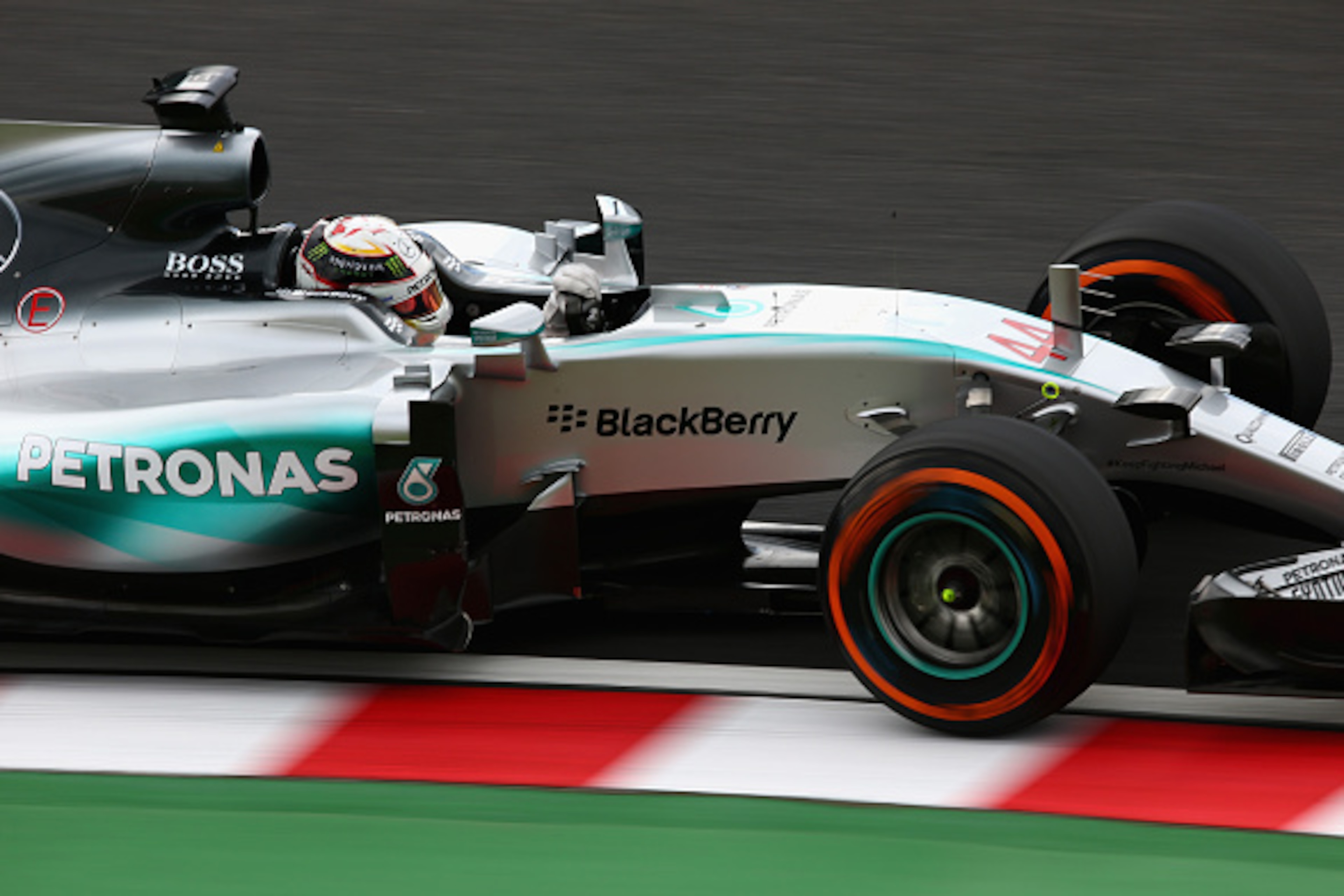 SUZUKA, JAPAN - SEPTEMBER 26:  Lewis Hamilton of Great Britain and Mercedes GP drives during final practice for the Formula One Grand Prix of Japan at Suzuka Circuit on September 26, 2015 in Suzuka.  (Photo by Clive Mason/Getty Images)