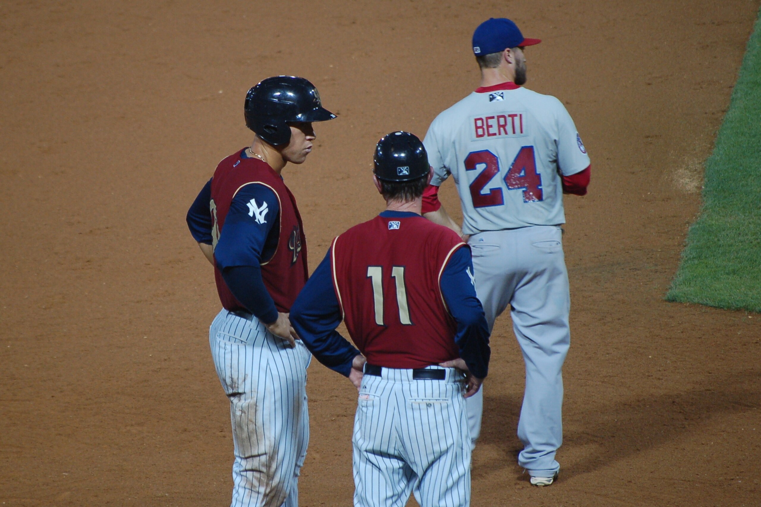 Yankees prospect Aaron Judge chats with manager Dave Miley during a RailRiders game this season.