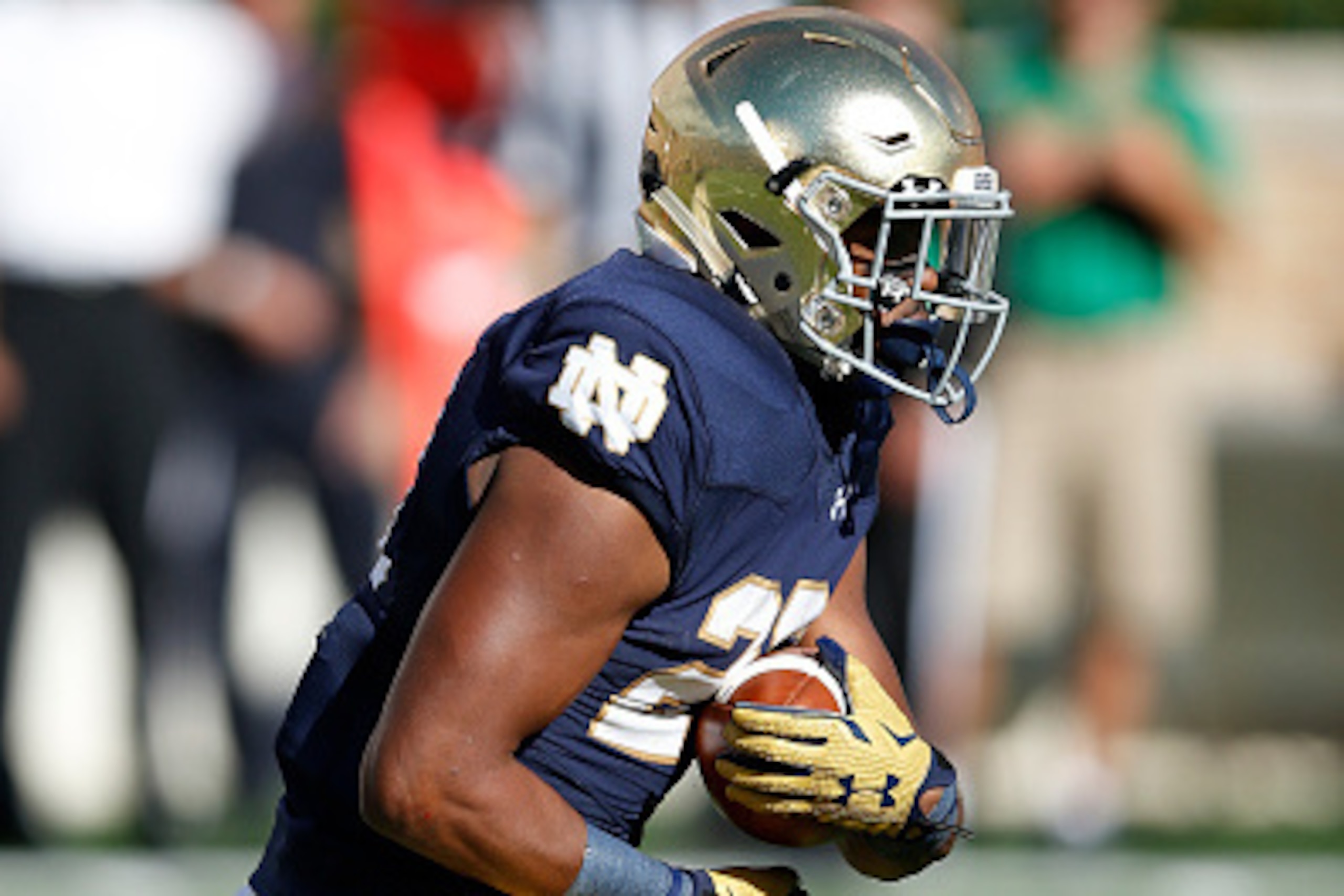 SOUTH BEND, IN - SEPTEMBER 19: C.J. Prosise #20 of the Notre Dame Fighting Irish runs with the ball against the Georgia Tech Yellow Jackets during the game at Notre Dame Stadium on September 19, 2015 in South Bend, Indiana. Notre Dame defeated Georgia Tec