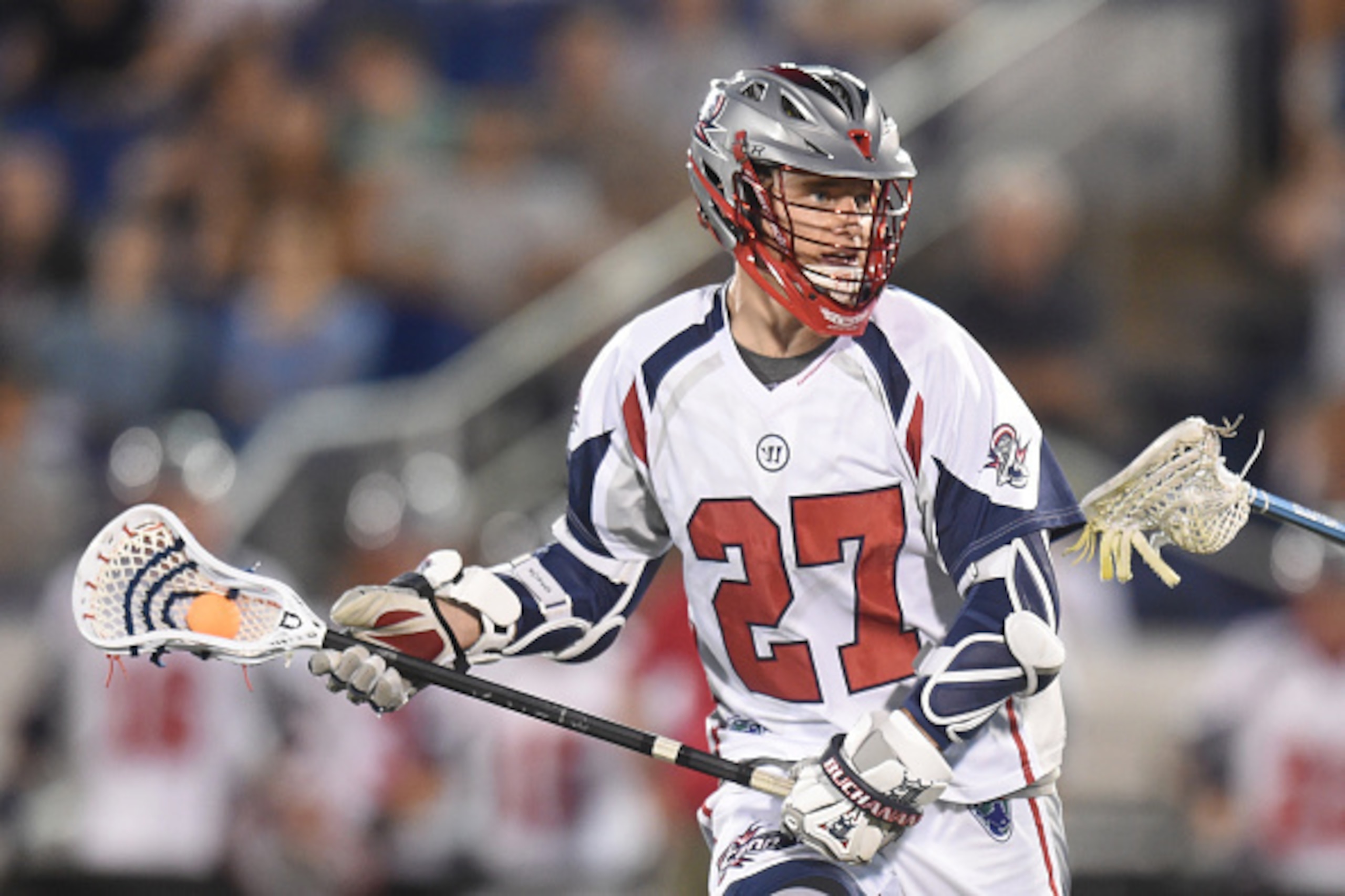 ANNAPOLIS, MD - JULY 16: Kevin Buchanan #17 of the Boston Cannons looks to pass the ball during a MLL Lacrosse game against the Chesapeake Bayhawks at Navy-Marine Corps Memorial Stadium on July 16, 2015 in Annapolis, Maryland. The Cannons won 9-8 in overt