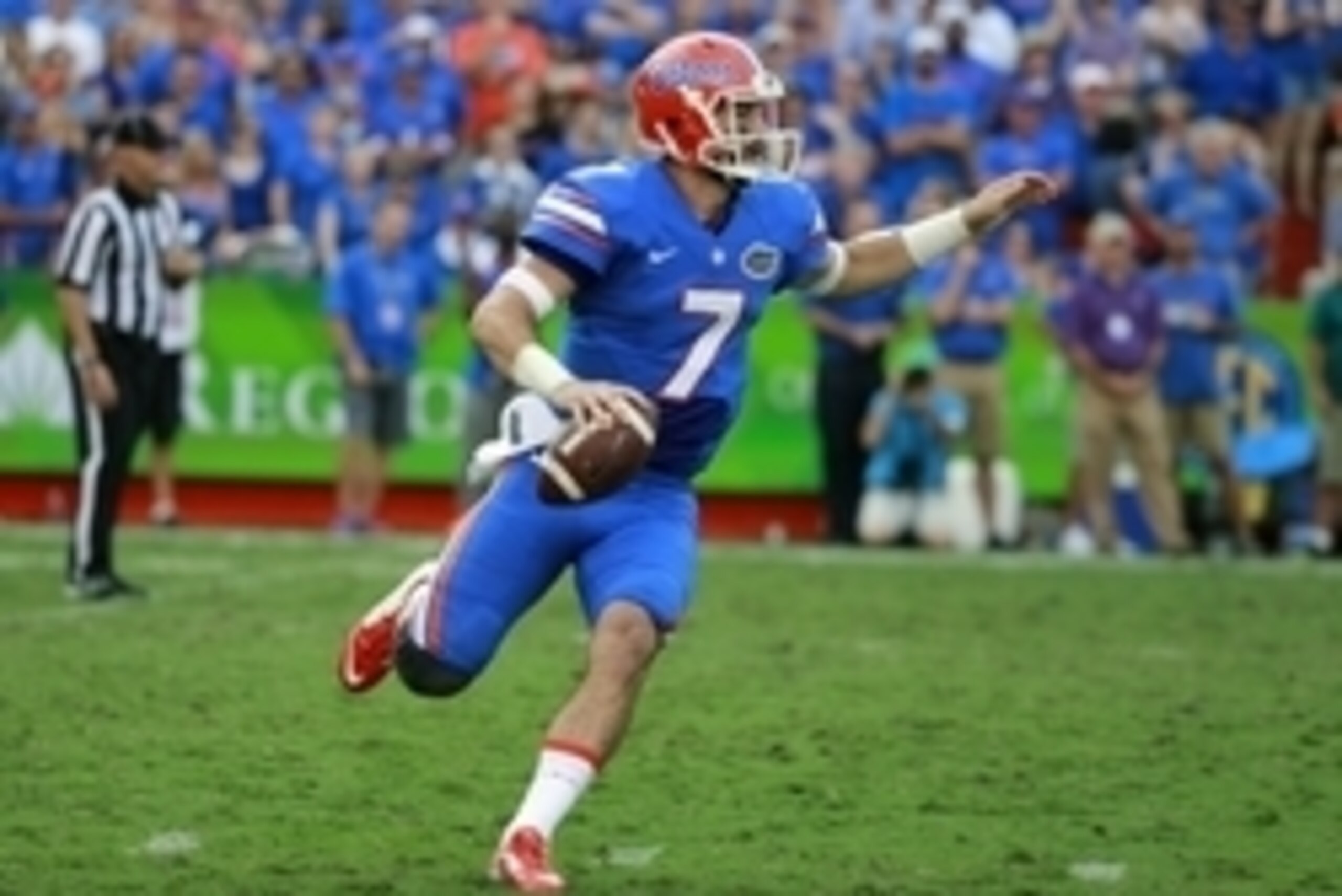 Sep 26, 2015; Gainesville, FL, USA; Florida Gators quarterback Will Grier (7) runs out of the pocket against the Tennessee Volunteers during the second half at Ben Hill Griffin Stadium. Florida Gators defeated the Tennessee Volunteers 28-27. Mandatory Cre