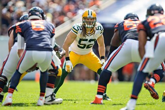 CHICAGO, IL - SEPTEMBER 13:  Clay Matthews #52 of the Green Bay Packers looks over the offense before the snap during a game against the Chicago Bears at Soldier Field on September 13, 2015 in Chicago, Illinois.  The Packers defeated the Bears 31-23.  (Ph