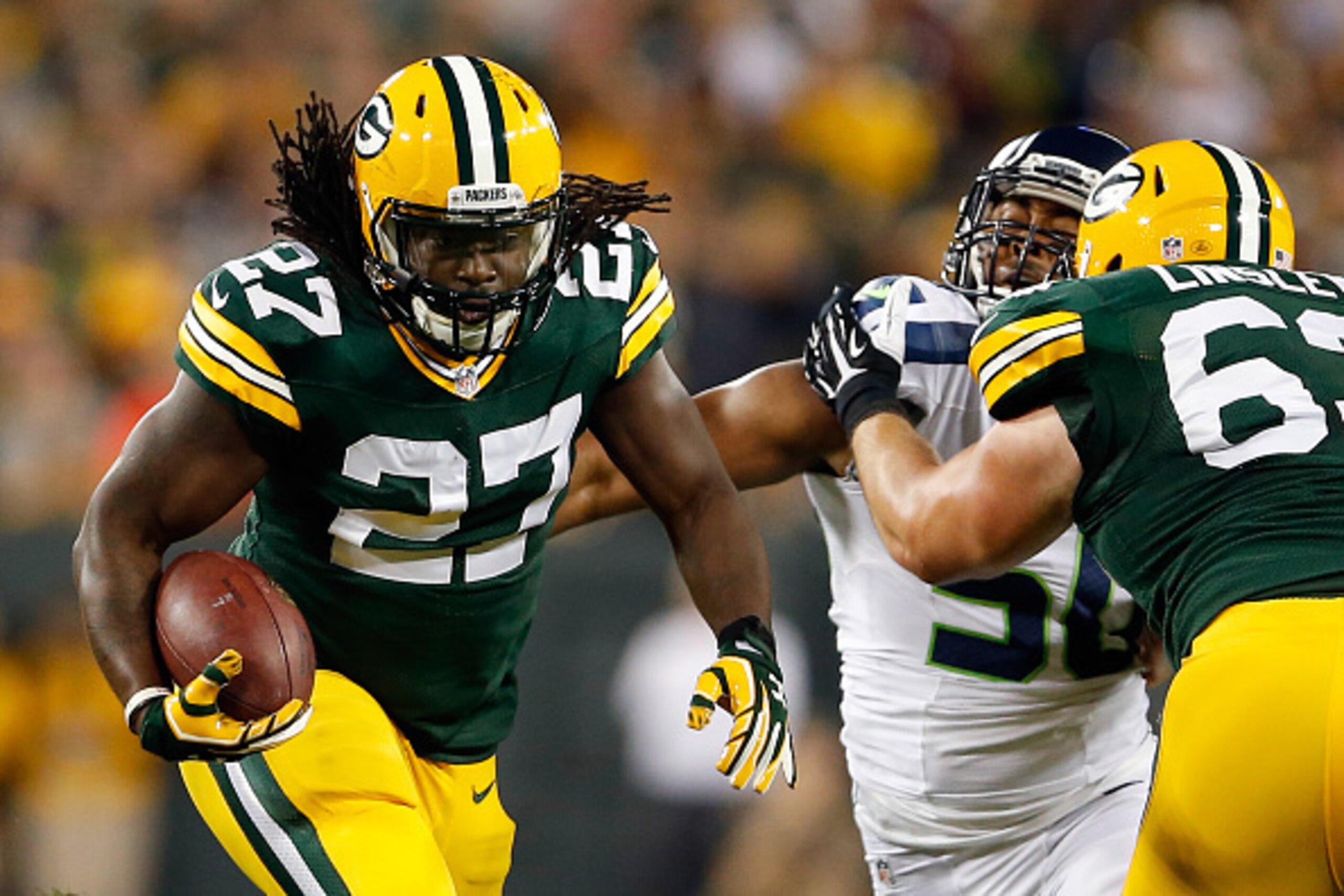 GREEN BAY, WI - SEPTEMBER 20:   Eddie Lacy #27 of the Green Bay Packers runs the ball in the first quarter against the Seattle Seahawks during their game at Lambeau Field on September 20, 2015 in Green Bay, Wisconsin.  (Photo by Christian Petersen/Getty I