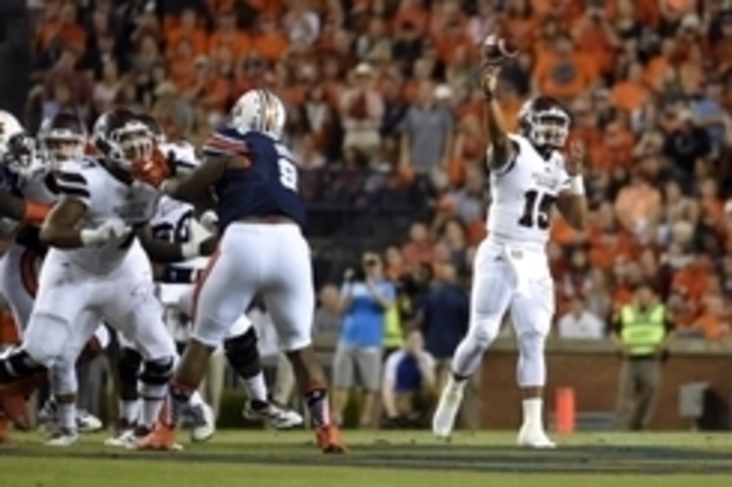 Sep 26, 2015; Auburn, AL, USA;  Mississippi State Bulldogs quarterback Dak Prescott (15) passing against the Auburn Tigers during the first quarter at Jordan Hare Stadium. Mandatory Credit: John David Mercer-USA TODAY Sports