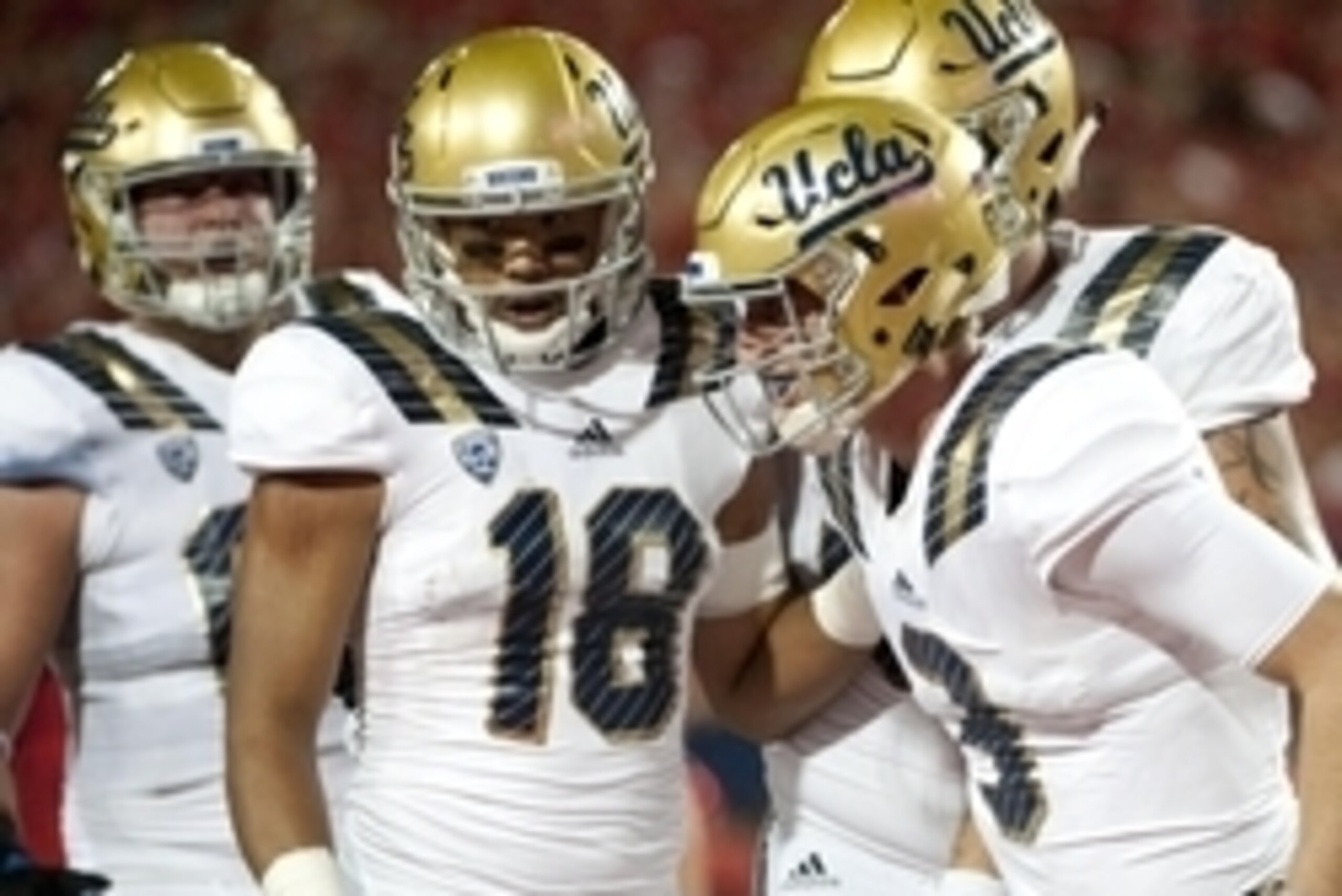 Sep 26, 2015; Tucson, AZ, USA; UCLA Bruins wide receiver Thomas Duarte (18) and quarterback Josh Rosen (3) celebrate after a touchdown during the third quarter against the Arizona Wildcats at Arizona Stadium. UCLA won 56-30. Mandatory Credit: Casey Sapio-