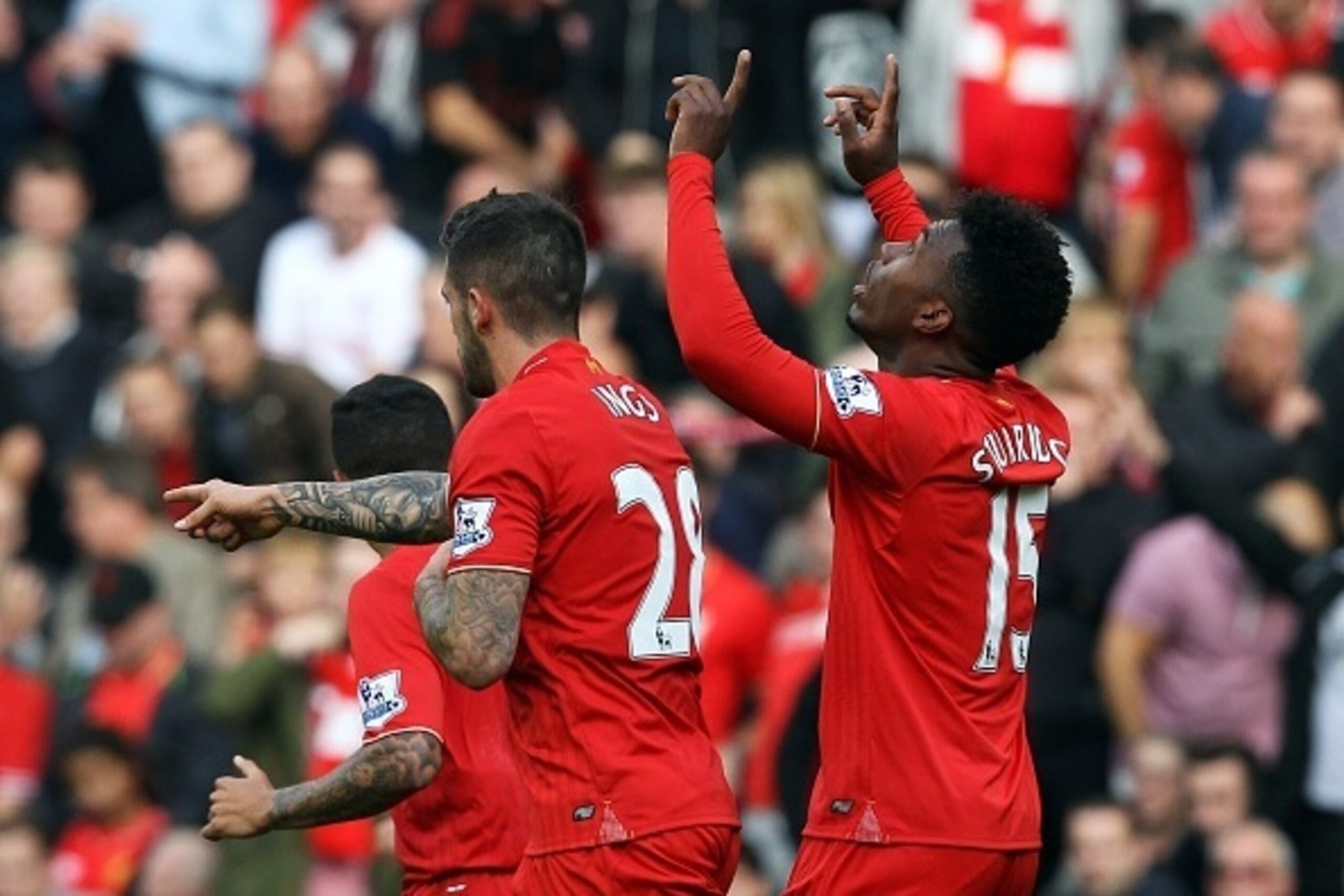 Liverpool's English striker Daniel Sturridge celebrates his team's second goal  during the English Premier League football match between Liverpool and Aston Villa at the Anfield stadium in Liverpool, north-west England on September 26, 2015. AFP PHOTO / L