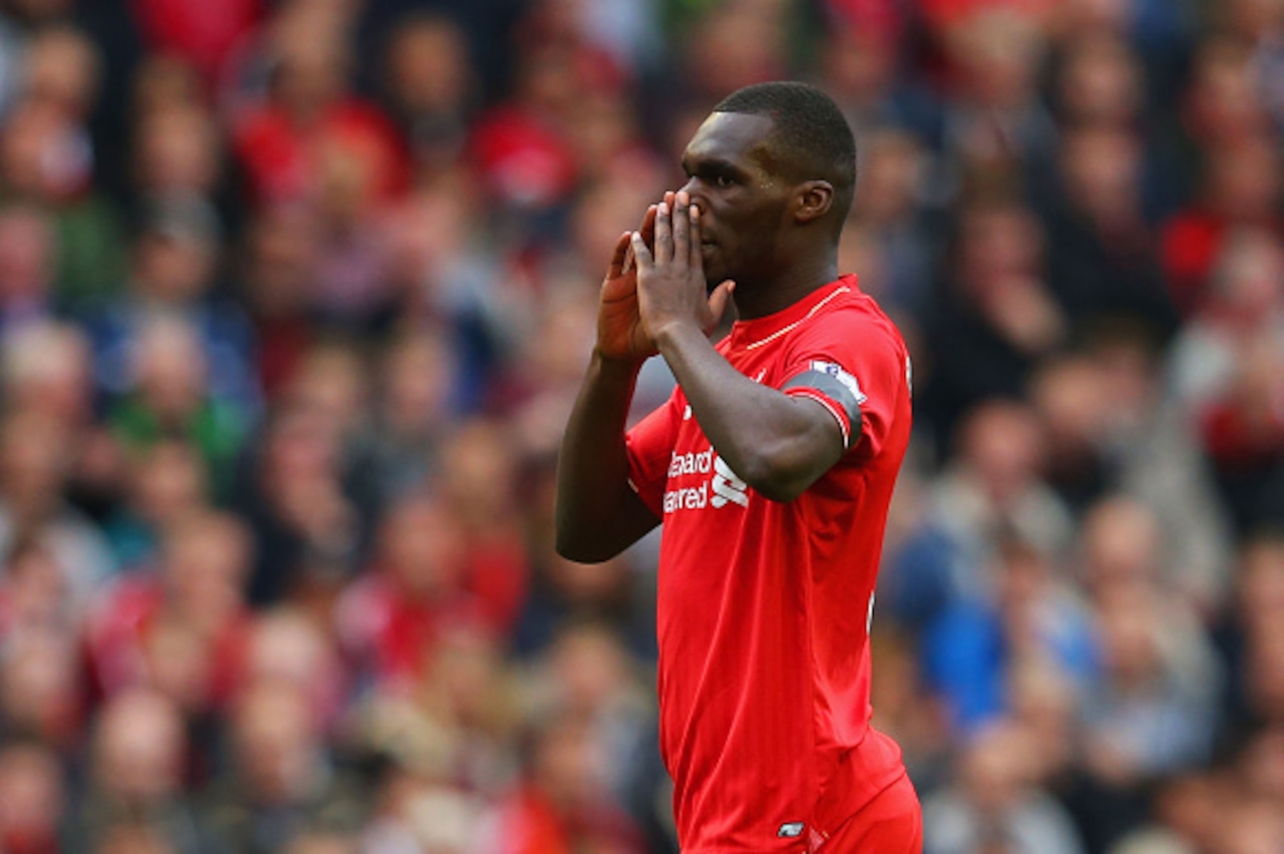 LIVERPOOL, ENGLAND - SEPTEMBER 20:  Christian Benteke of Liverpool reacts during the Barclays Premier League match between Liverpool and Norwich City at Anfield on September 20, 2015 in Liverpool, United Kingdom.  (Photo by Alex Livesey/Getty Images)