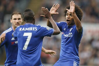 NEWCASTLE UPON TYNE, ENGLAND - SEPTEMBER 26:  Willian of Chelsea celebrates scoring his team's second goal during the Barclays Premier League match between Newcastle United and Chelsea at St James' Park on September 26, 2015 in Newcastle upon Tyne, United