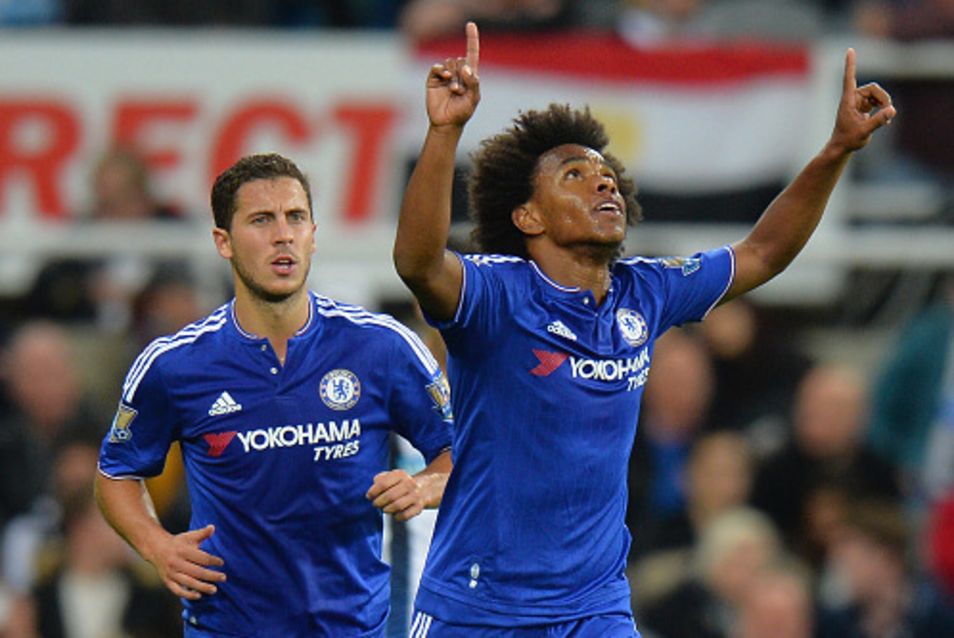 NEWCASTLE UPON TYNE, ENGLAND - SEPTEMBER 26:  Willian of Chelsea celebrates scoring his team's second goal during the Barclays Premier League match between Newcastle United and Chelsea at St James' Park on September 26, 2015 in Newcastle upon Tyne, United