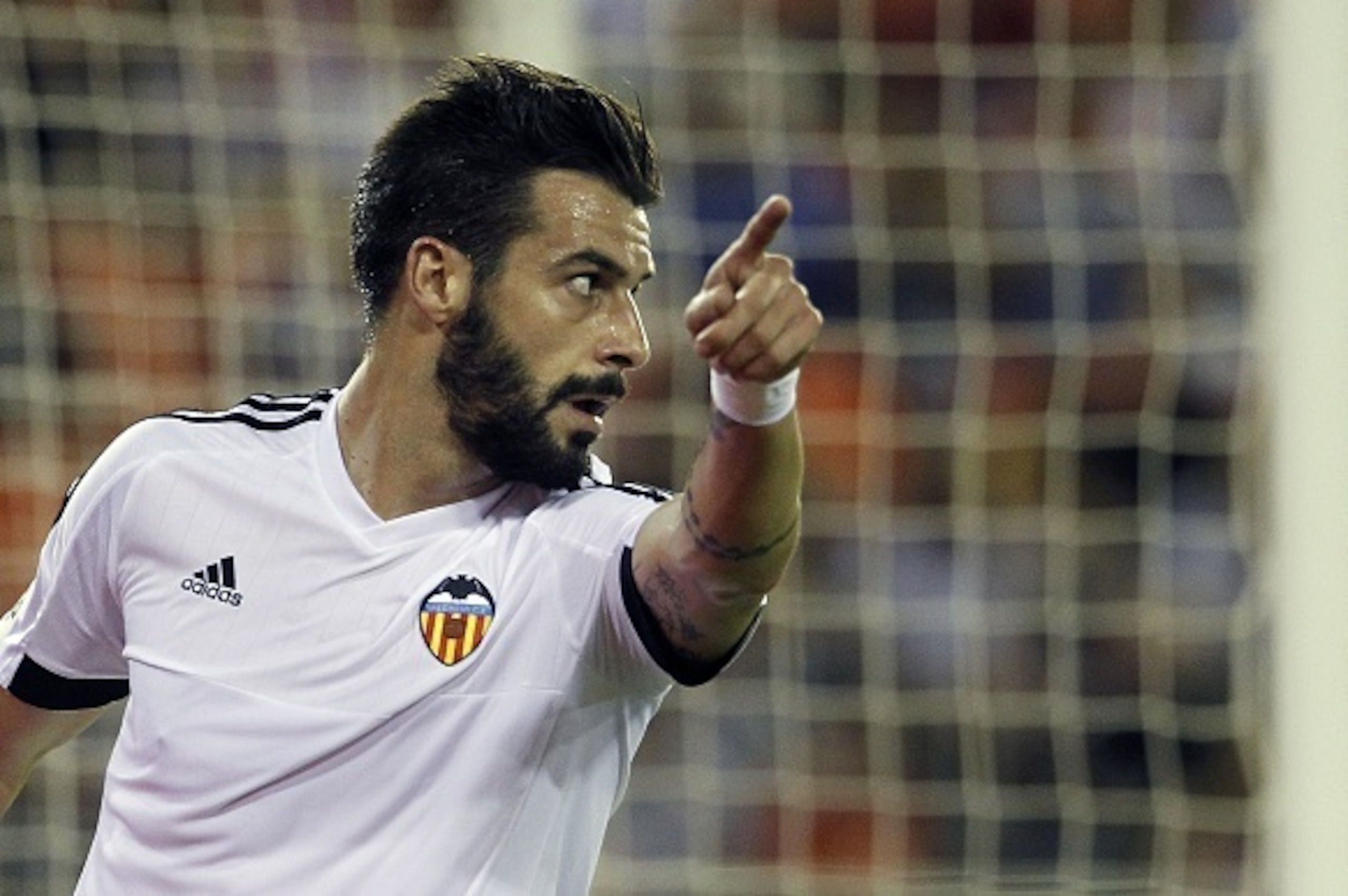 Valencia's forward Alvaro Negredo gestures during the Spanish league football match Valencia CF vs Granada CF at the Mestalla stadium in Valencia on September 25, 2015.  AFP PHOTO / JOSE JORDAN        (Photo credit should read JOSE JORDAN/AFP/Getty Images