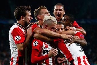 EINDHOVEN, NETHERLANDS - SEPTEMBER 15:  PSV Eindhoven players celebrate the goal scored by Hector Moreno #3 during the UEFA Champions League Group B match between PSV Eindhoven and Manchester United at PSV Stadion on September 15, 2015 in Eindhoven, Nethe