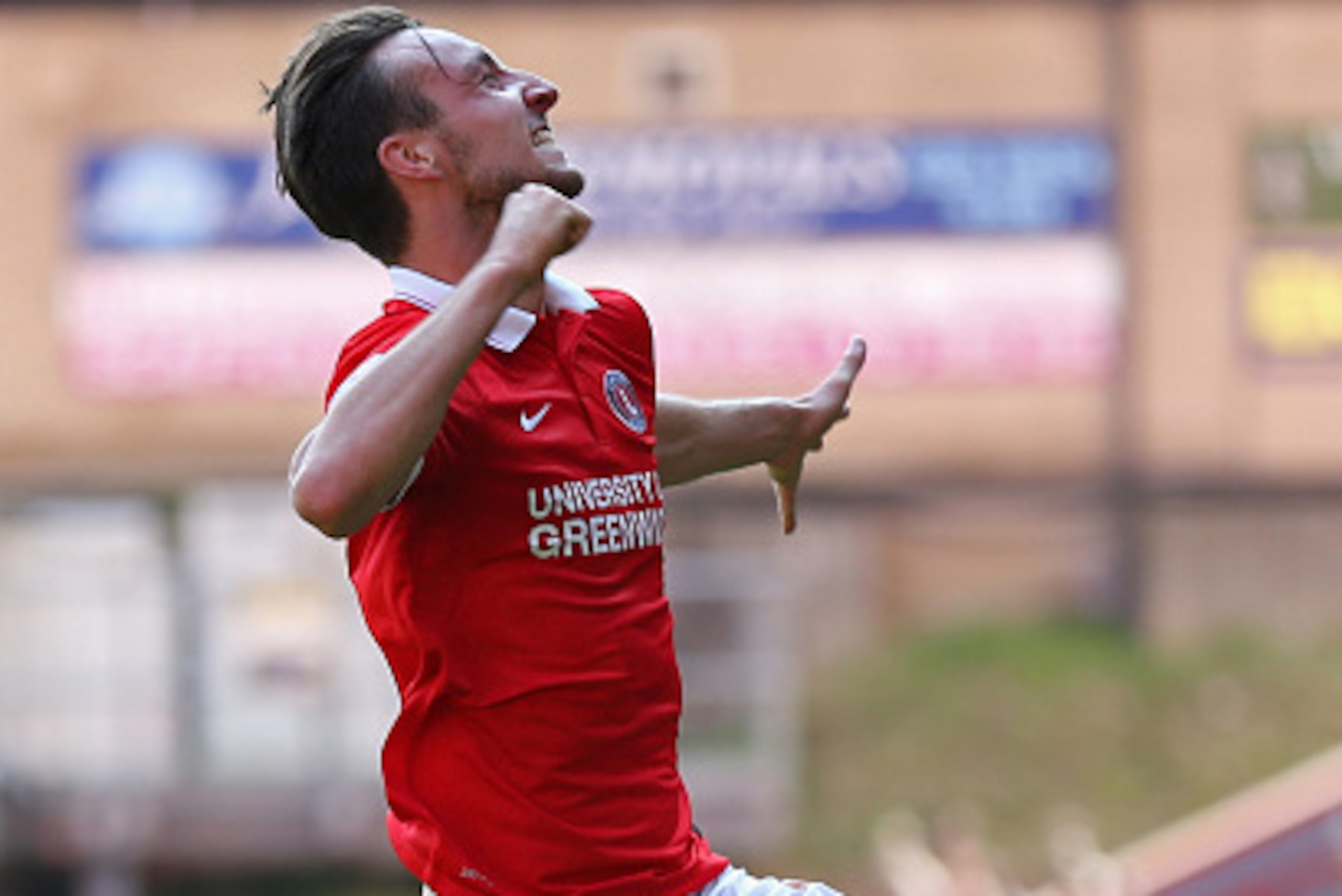 LONDON, ENGLAND - AUGUST 08: Morgan Fox of Charlton Athletic celebrates scoring a goal during the Sky Bet Championship match between Charlton Athletic v Queens Park Rangers at The Valley on August 8, 2015 in London, England.  (Photo by Steve Bardens/Getty