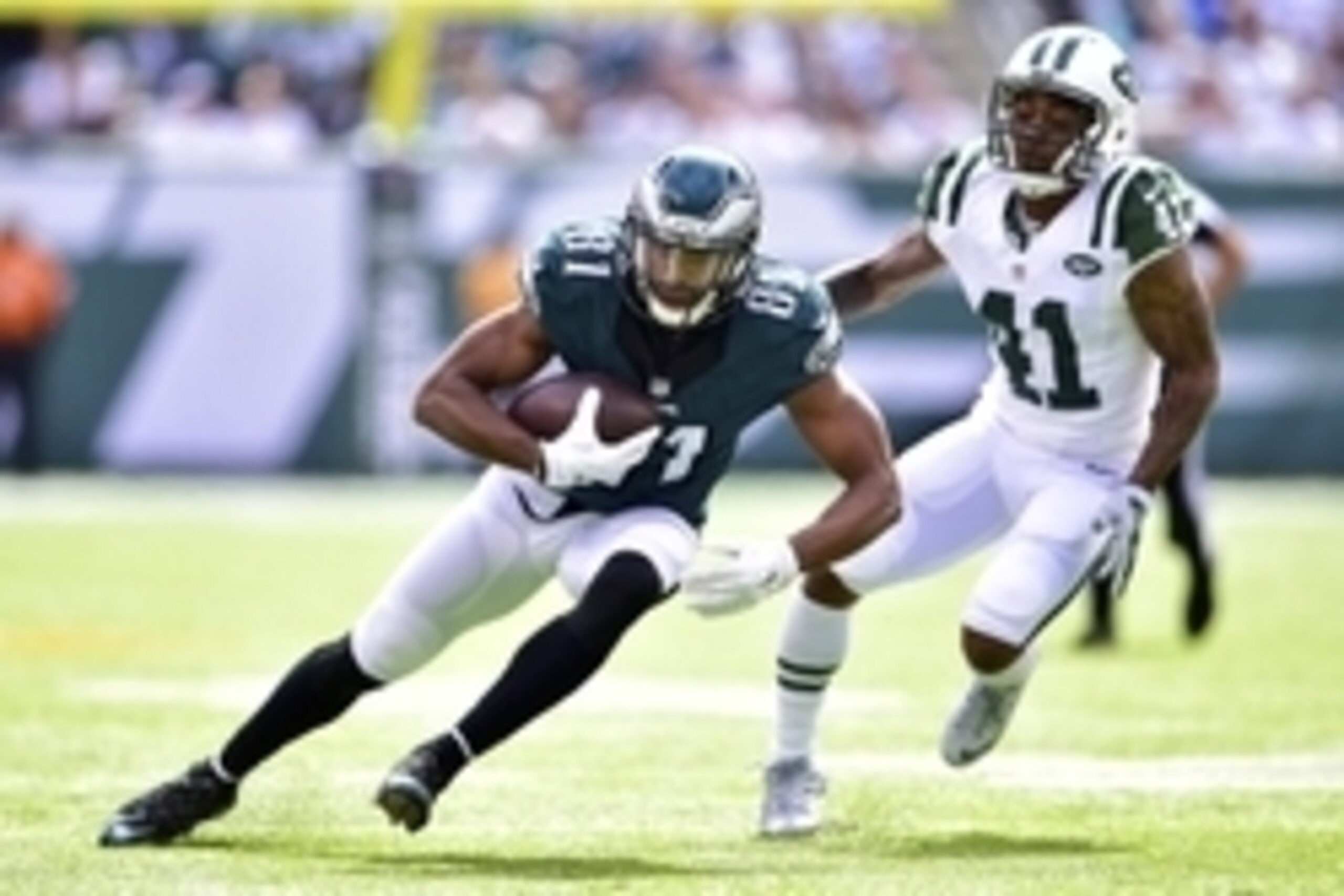 Sep 27, 2015; East Rutherford, NJ, USA; Philadelphia Eagles wide receiver Jordan Matthews (81) is pursued by New York Jets defensive back Buster Skrine (41) during the first quarter at MetLife Stadium. Mandatory Credit: Steven Ryan-USA TODAY Sports