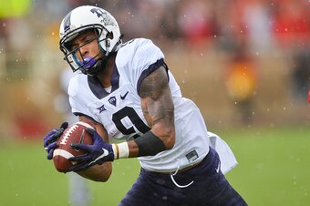 LUBBOCK, TX - SEPTEMBER 26: Josh Doctson #9 of the TCU Horned Frogs comes down with the ball against the Texas Tech Red Raiders on September 26, 2015 at Jones AT&T Stadium in Lubbock, Texas. TCU won the game 55-52. Photo by John Weast/Getty Images)