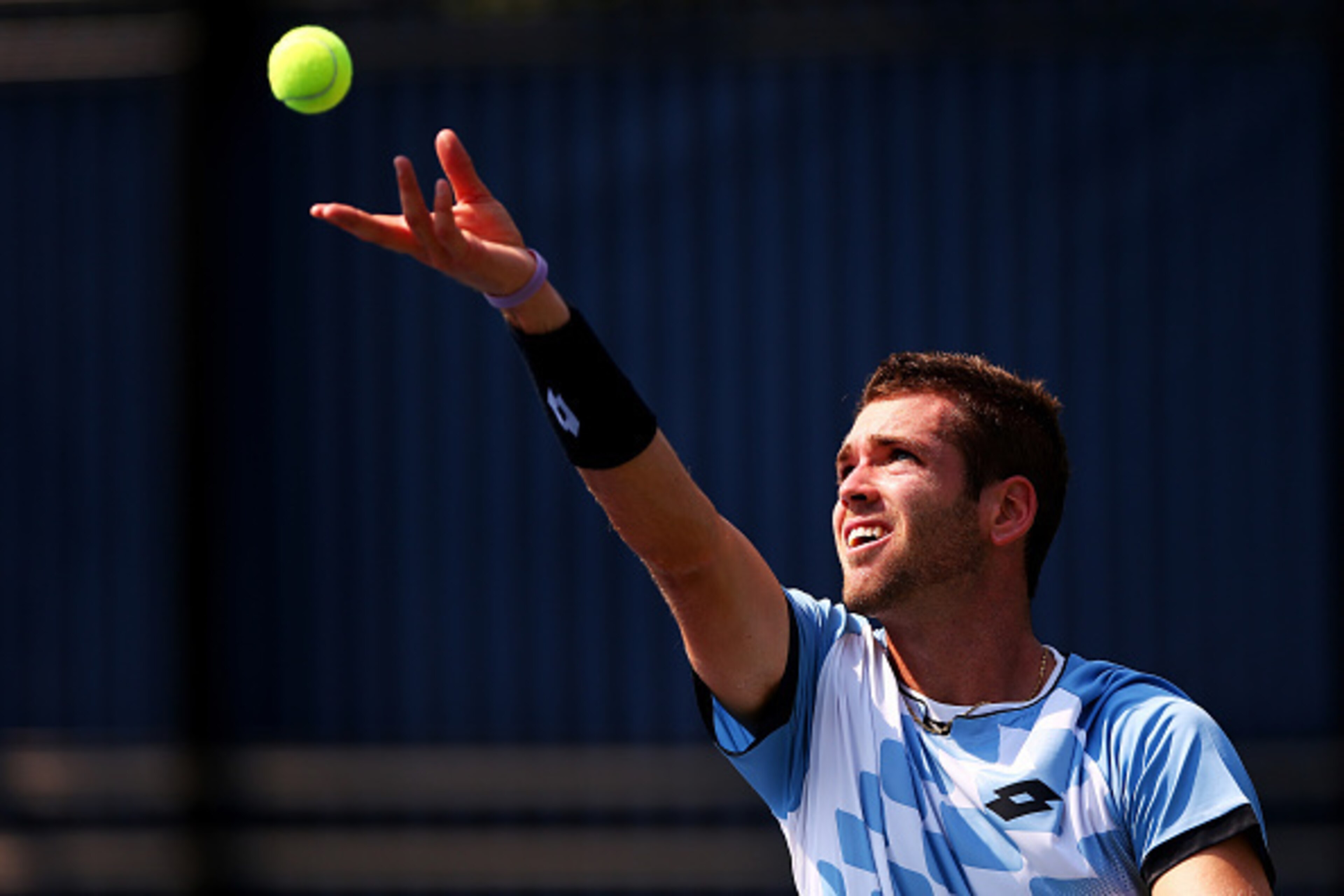 NEW YORK, NY - SEPTEMBER 01:  Austin Krajicek of the United States serves against Santiago Giraldo of Colombia during their Men's Singles First Round match on Day Two of the 2015 US Open at the USTA Billie Jean King National Tennis Center on September 1, 