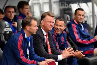 SWANSEA, WALES - AUGUST 30:  Manchester United manager Louis van Gaal and Ryan Giggs share a joke before the Barclays Premier League match between Swansea City and Manchester United on August 30, 2015 in Swansea, United Kingdom.  (Photo by Stu Forster/Get