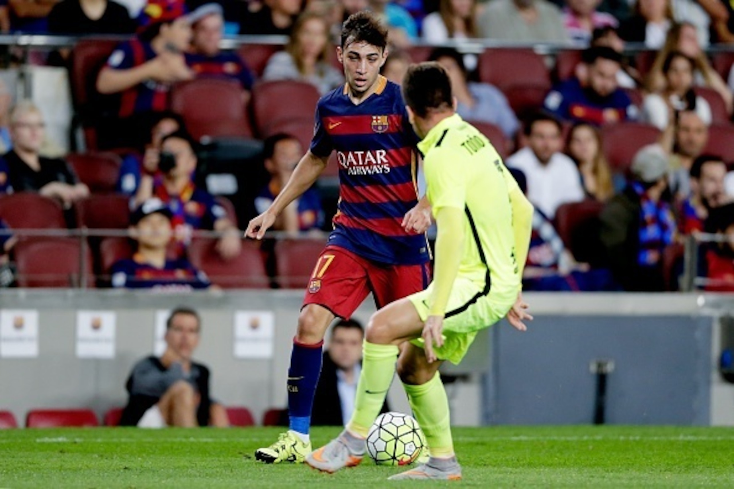 (L-R) Munir El Haddadi of FC Barcelona, Tono of Levante UD during the Primera Division match between FC Barcelona and Levante UD on September 20, 2015 at Camp Nou stadium in Barcelona, Spain.(Photo by VI Images via Getty Images)
