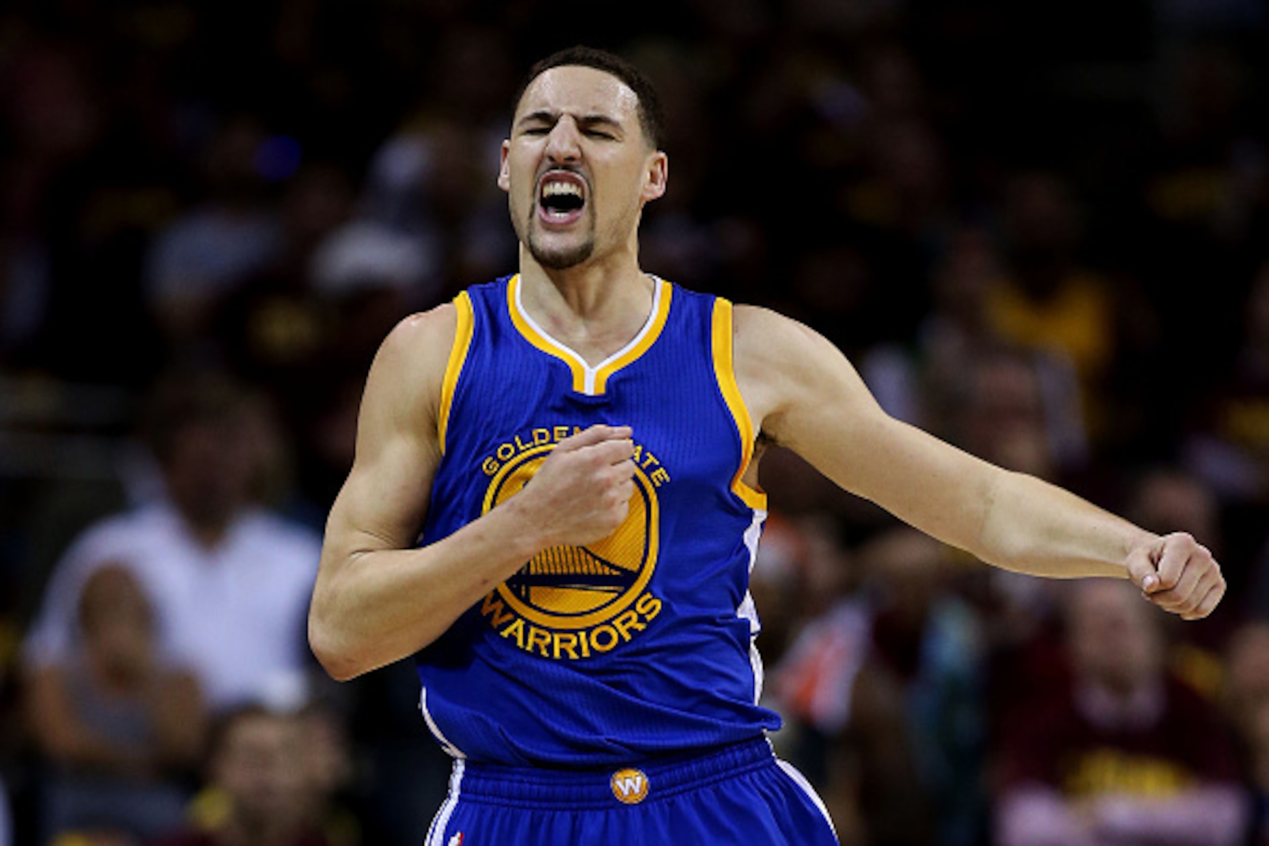 CLEVELAND, OH - JUNE 16:  Klay Thompson #11 of the Golden State Warriors celebrates a three pointer in the fourth quarter against the Cleveland Cavaliers during Game Six of the 2015 NBA Finals at Quicken Loans Arena on June 16, 2015 in Cleveland, Ohio. NO