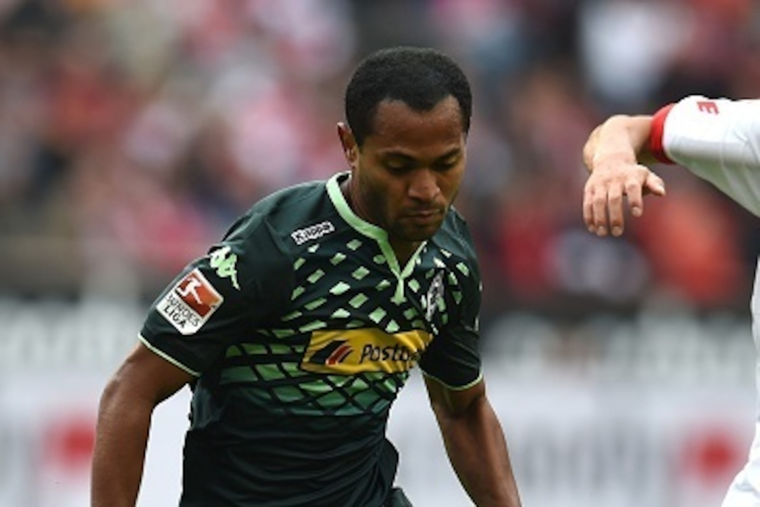Moenchengladbach's Brazilian midfielder Raffael runs with the ball during the German first division Bundesliga football match FC Cologne vs Borussia Moenchengladbach in Cologne, western Germany on September 19, 2015. Cologne won the match 1-0.    AFP PHOT