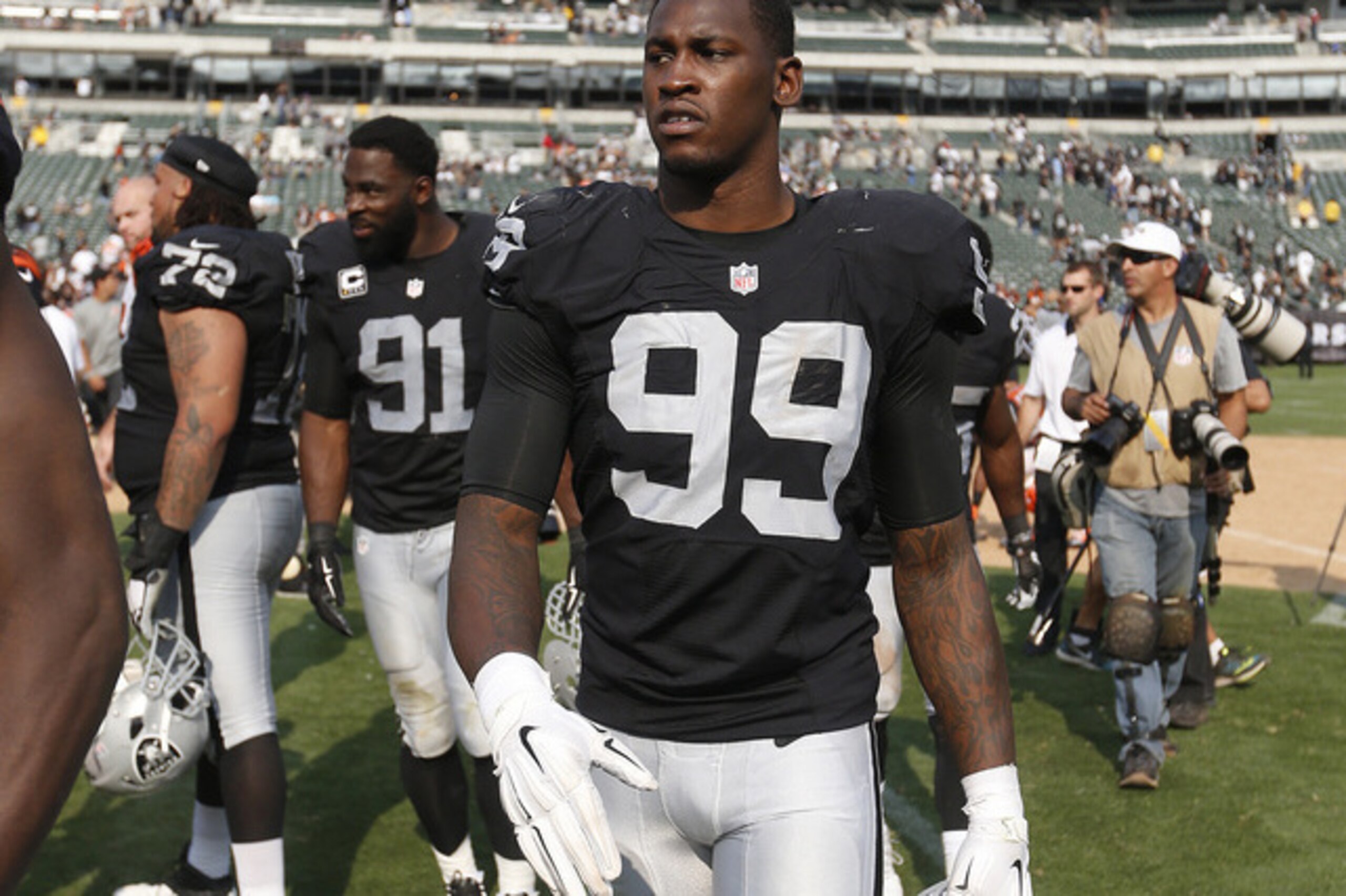 No. 99 Aldon Smith and No. 91 Justin Tuck
