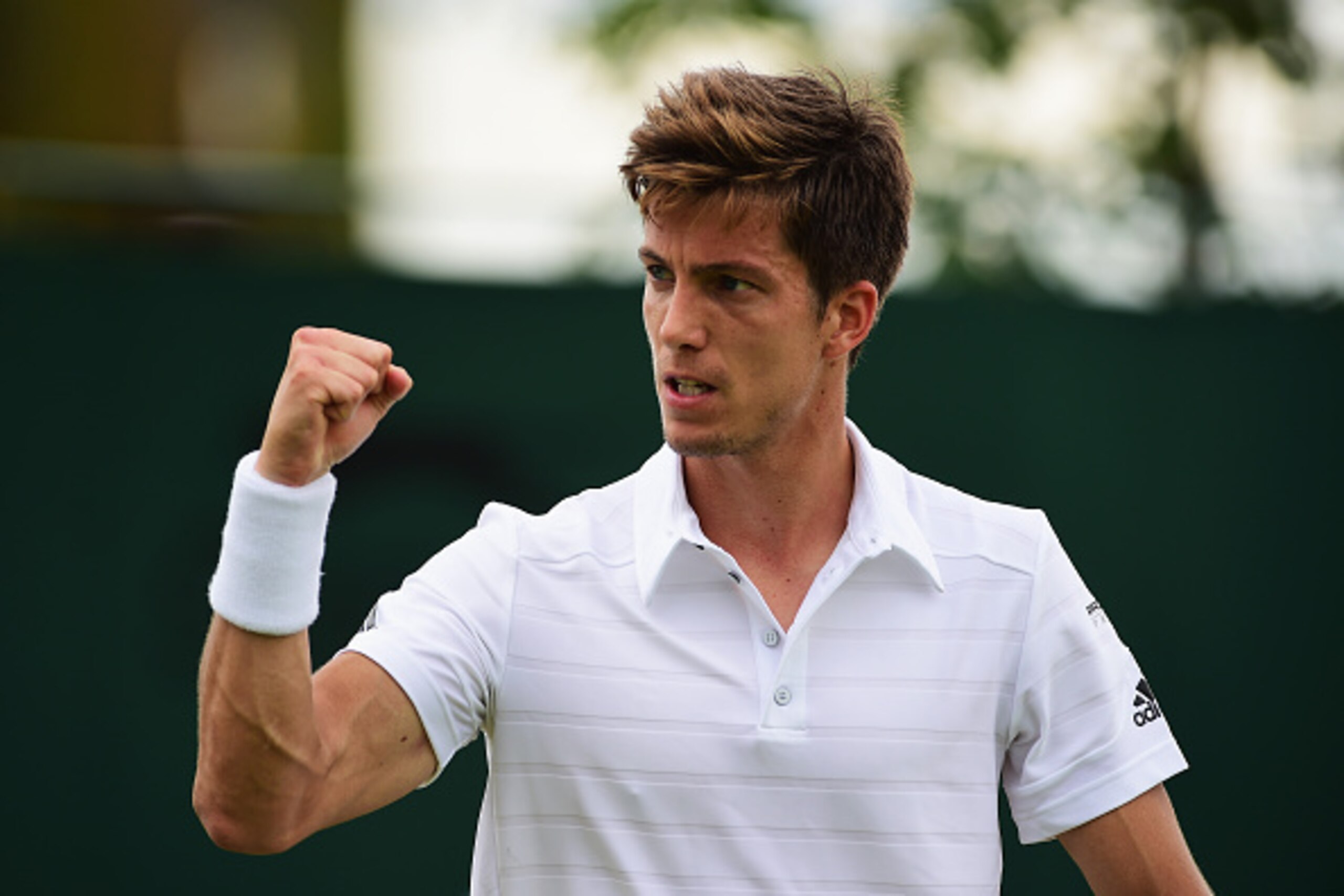 LONDON, ENGLAND - JULY 02:  Aljaz Bedene of Great Britain celebrates during his Gentlemens Singles Second Round match against Viktor Troicki of Serbia during day four of the Wimbledon Lawn Tennis Championships at the All England Lawn Tennis and Croquet Cl