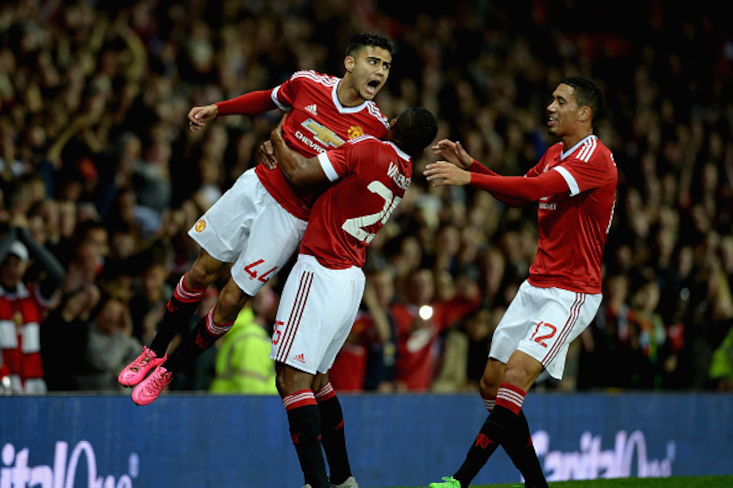 MANCHESTER, ENGLAND - SEPTEMBER 23: Andreas Pereira of Manchester United celebrates with Antonio Valencia after scoring his team's second goal during the Capital One Cup Third Round match between Manchester United and Ipswich Town at Old Trafford on Sept MANCHESTER, ENGLAND - SEPTEMBER 23: Andreas Pereira of Manchester United celebrates with Antonio Valencia after scoring his team's second goal during the Capital One Cup Third Round match between Manchester United and Ipswich Town at Old Trafford on Sept