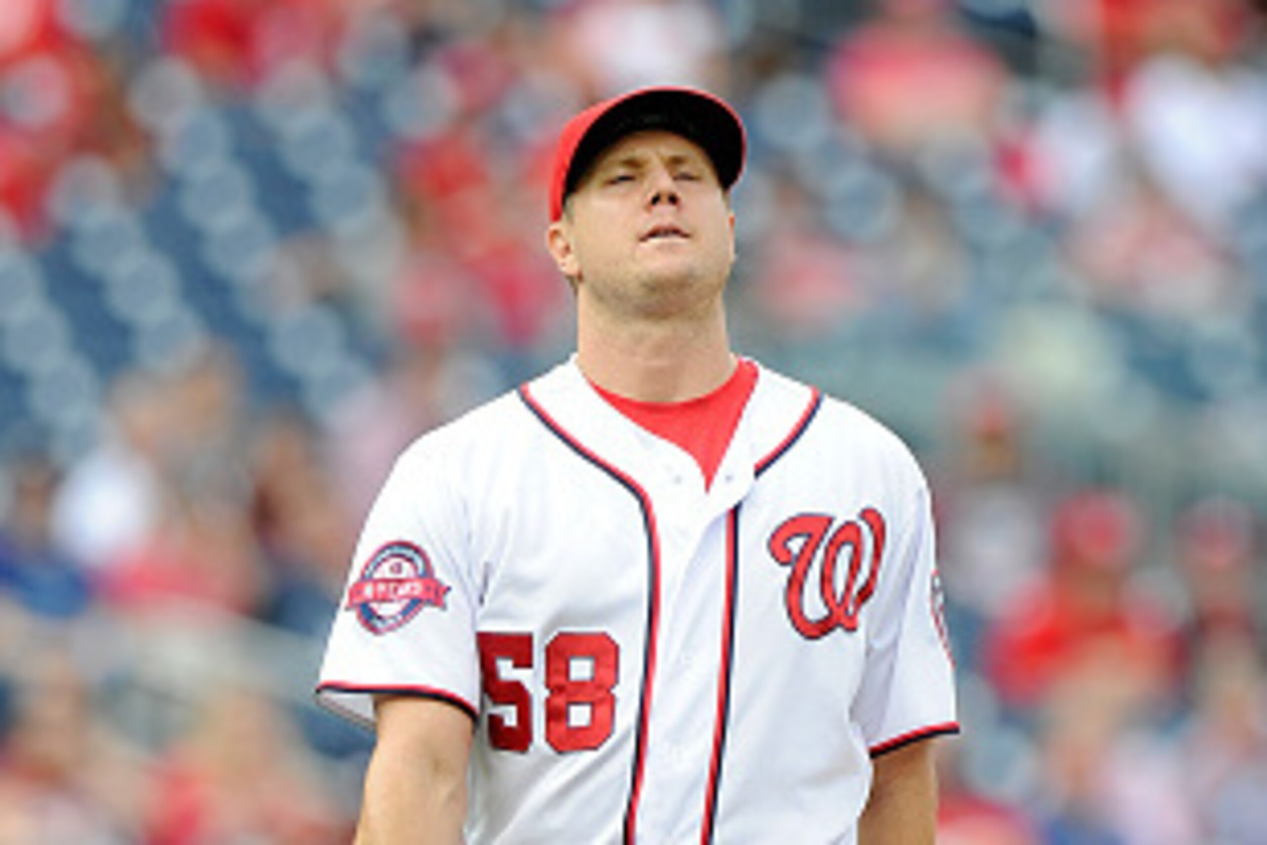 WASHINGTON, DC - SEPTEMBER 27:  Jonathan Papelbon #58 of the Washington Nationals reacts after hitting Odubel Herrera #37 (not pictured) of the Philadelphia Phillies in the ninth inning at Nationals Park on September 27, 2015 in Washington, DC.  (Photo by