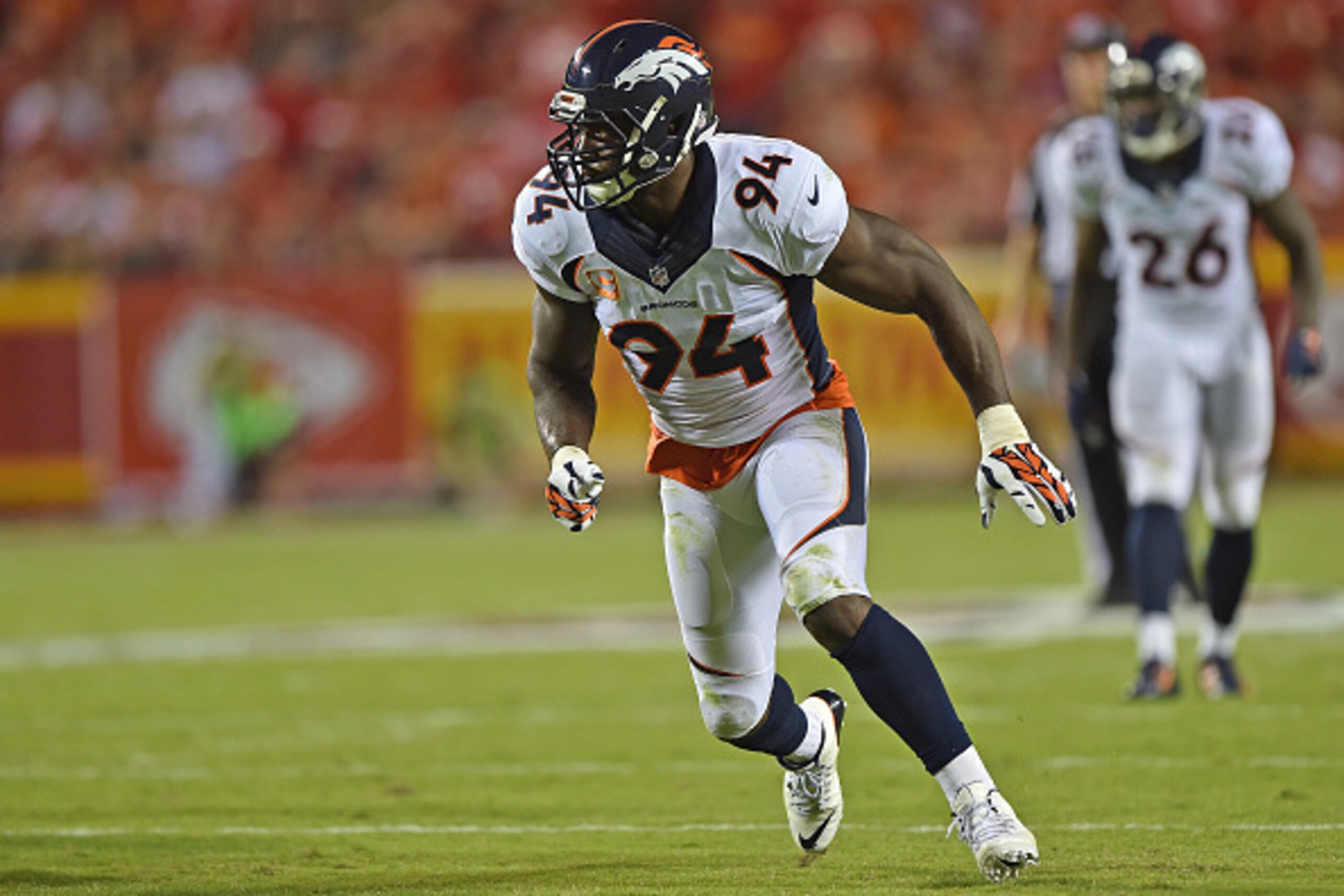KANSAS CITY, MO - SEPTEMBER 17:  Linebacker DeMarcus Ware #94 of the Denver Broncos gets set on defense against the Kansas City Chiefs during the first half at Arrowhead Stadium on September 17, 2015 in Kansas City, Missouri.  (Photo by Peter G. Aiken/Get