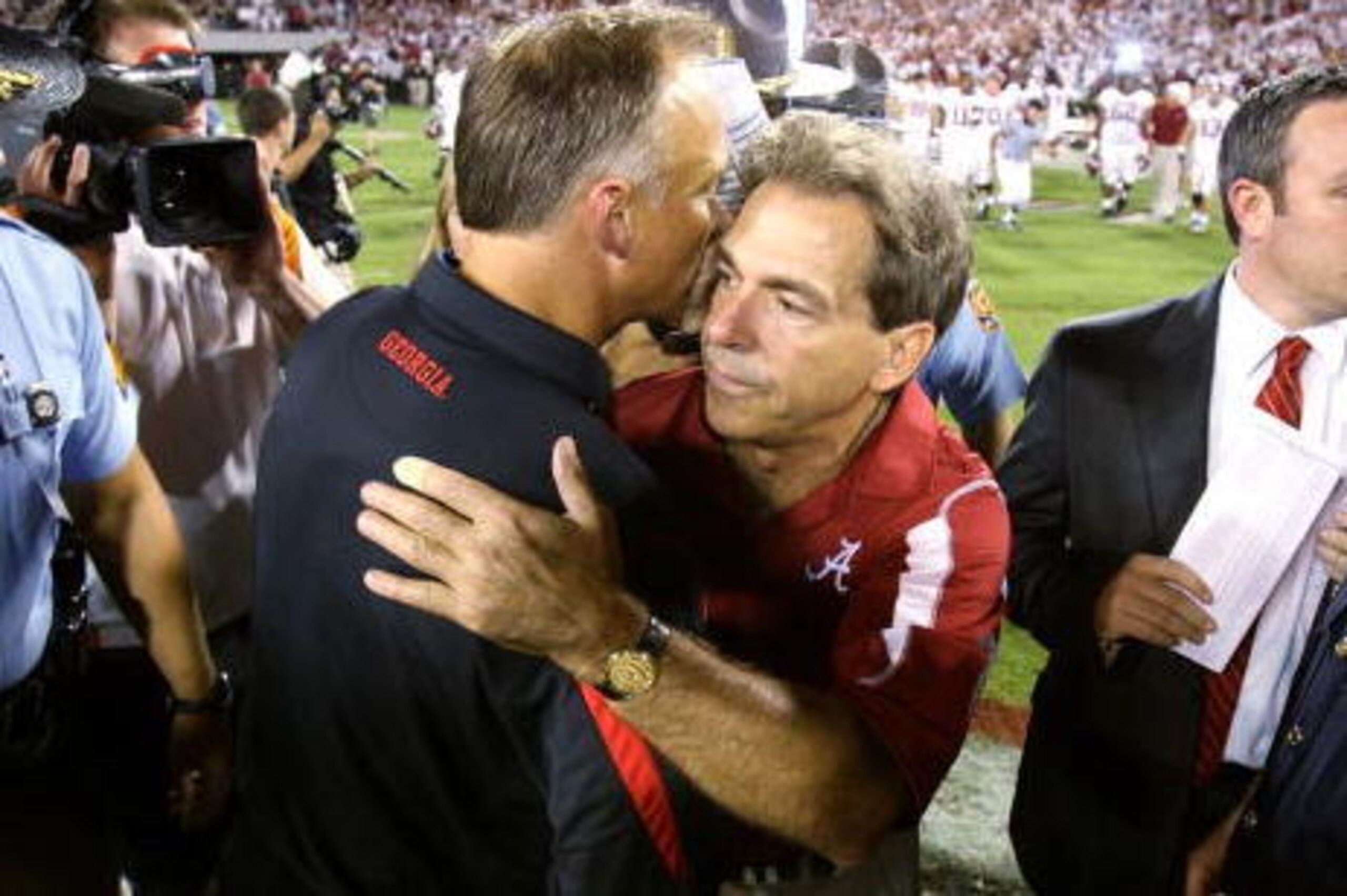 ATHENS, GA - SEPTEMBER 27:  Head coach Nick Saban of the Alabama Crimson Tide is congratulated by head coach Mark Richt of the Georgia Bulldogs at Sanford Stadium on September 27, 2008 in Athens, Georgia. Alabama defeated Georgia 41-30.  (Photo by Doug Be