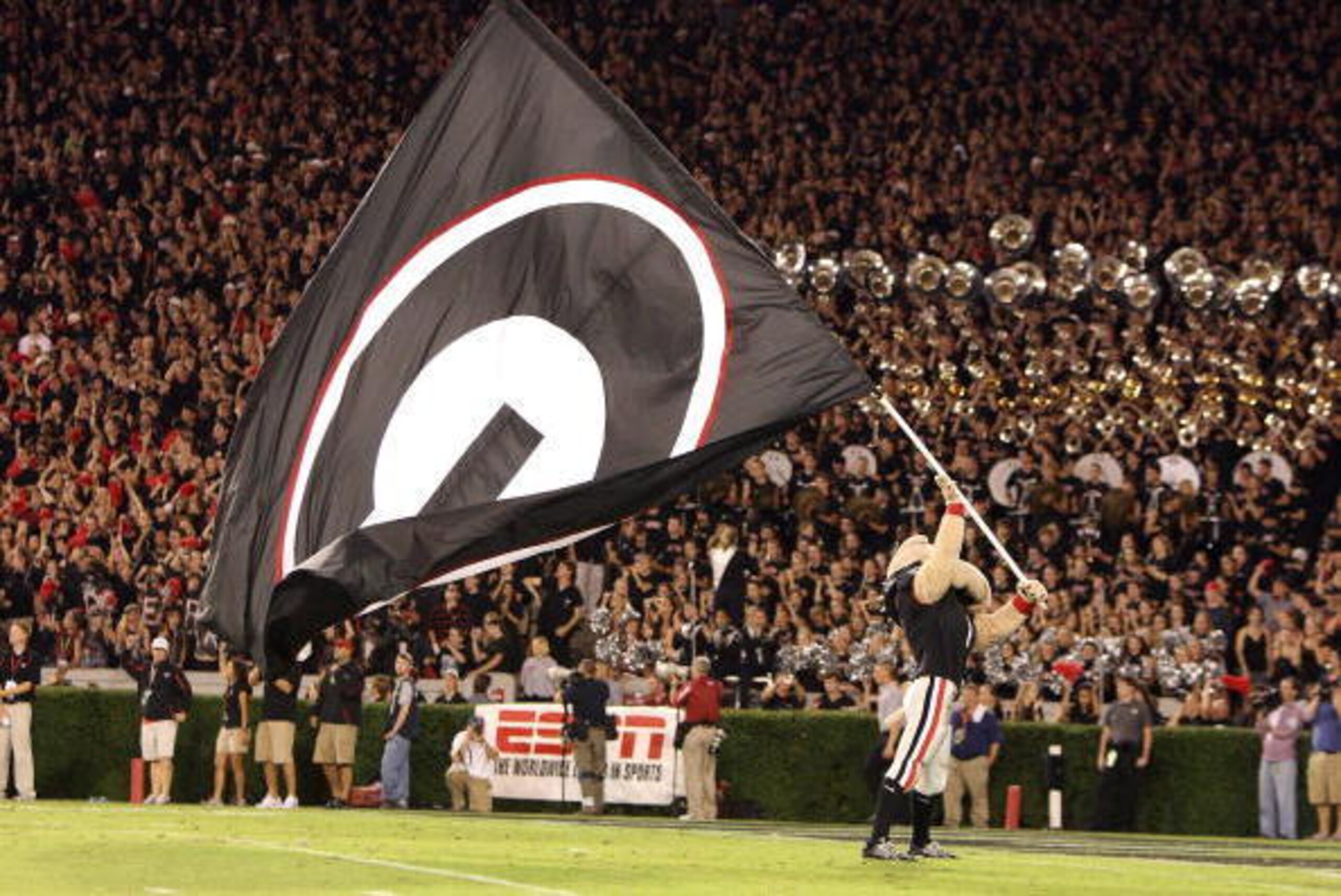 ATHENS, GA - SEPTEMBER 27:  The mascot of Georgia carries the Georgia flag after a touchdown as the Alabama Crimson Tide take on the Georgia Bulldogs at Sanford Stadium on September 27, 2008 in Athens, Georgia. Alabama defeated Georgia 41-30.  (Photo by D