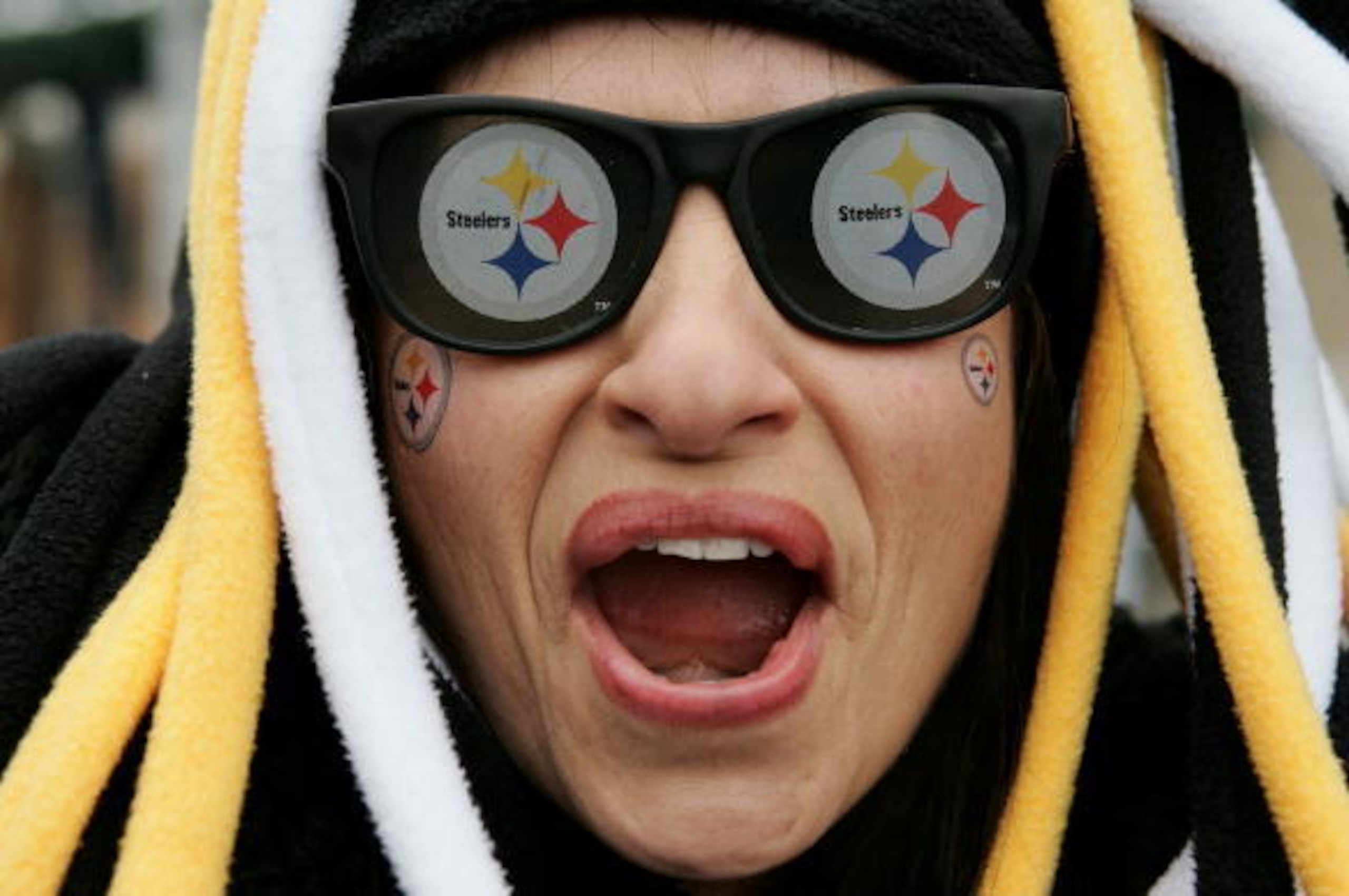 DETROIT - FEBRUARY 5:  Pittsburgh Steelers fan Diane Cuscino from Newcastle, Pennsylvania, gets ready outside the stadium for Super Bowl XL between the Seattle Seahawks and the Pittsburgh Steelers at Ford Field February 5, 2006 in Detroit, Michigan.  (Pho