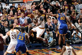 CLEVELAND, OH - JUNE 16: Iman Shumpert #4 of the Cleveland Cavaliers shoots against the Golden State Warriors in Game Six of the 2015 NBA Finals at The Quicken Loans Arena on June 16, 2015 in Cleveland, OH. NOTE TO USER: User expressly acknowledges and ag