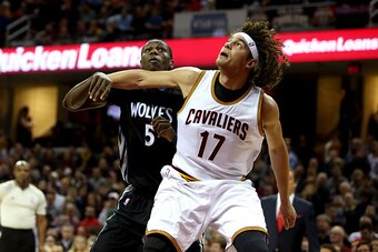 CLEVELAND, OH - DECEMBER 23: Anderson Varejao #17 of the Cleveland Cavaliers and Gorgui Dieng #5 of the Minnesota Timberwolves fight for position under the basket at Quicken Loans Arena on December 23, 2014 in Cleveland, Ohio. NOTE TO USER: User expressly