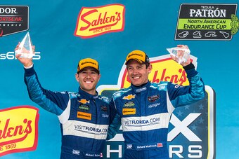 WATKINS GLEN, NY - JUNE 28: Michael Valiante, left, and Richard Westbrook celebrate after winning the Sahlen's Six Hours of the Glen at Watkins Glen International on June 28, 2015 in Watkins Glen, New York. (Photo by Brian Cleary/Getty Images)