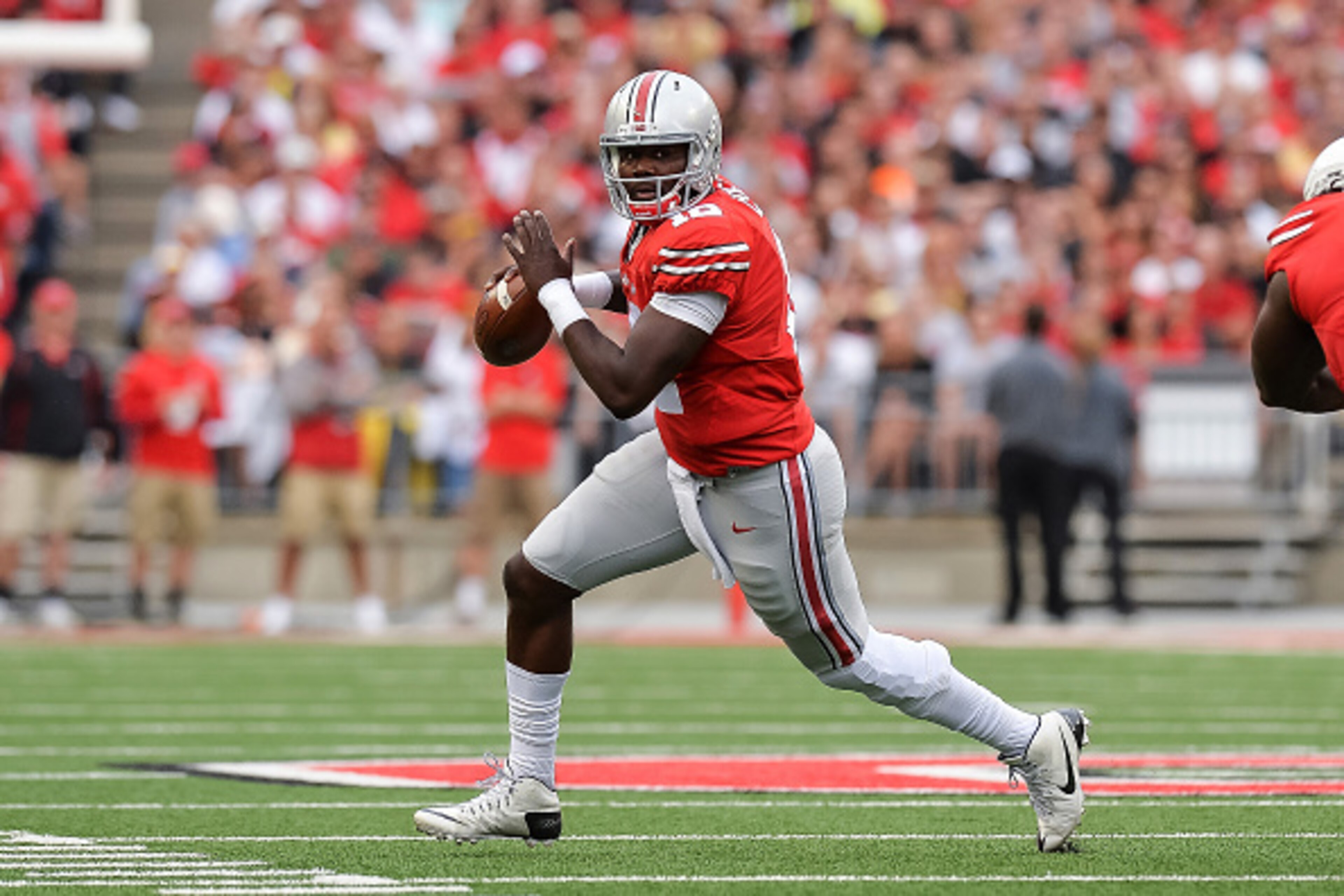 COLUMBUS, OH - SEPTEMBER 26:  Quarterback Cardale Jones #12 of the Ohio State Buckeyes runs with the ball against the Western Michigan Broncos at Ohio Stadium on September 26, 2015 in Columbus, Ohio.   (Photo by Jamie Sabau/Getty Images)