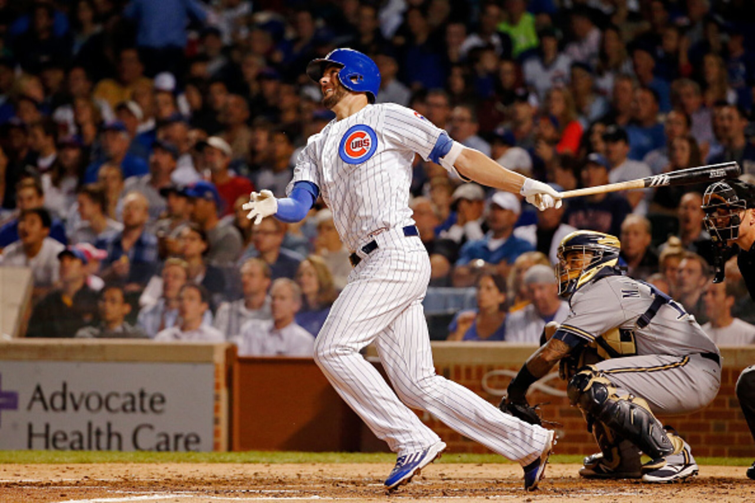 CHICAGO, IL - SEPTEMBER 22: Kris Bryant #17 of the Chicago Cubs watches his two run home run against the Milwaukee Brewers during the third inning at Wrigley Field on September 22, 2015 in Chicago, Illinois. The blast was Bryant's 25th of the season, bre CHICAGO, IL - SEPTEMBER 22: Kris Bryant #17 of the Chicago Cubs watches his two run home run against the Milwaukee Brewers during the third inning at Wrigley Field on September 22, 2015 in Chicago, Illinois. The blast was Bryant's 25th of the season, bre