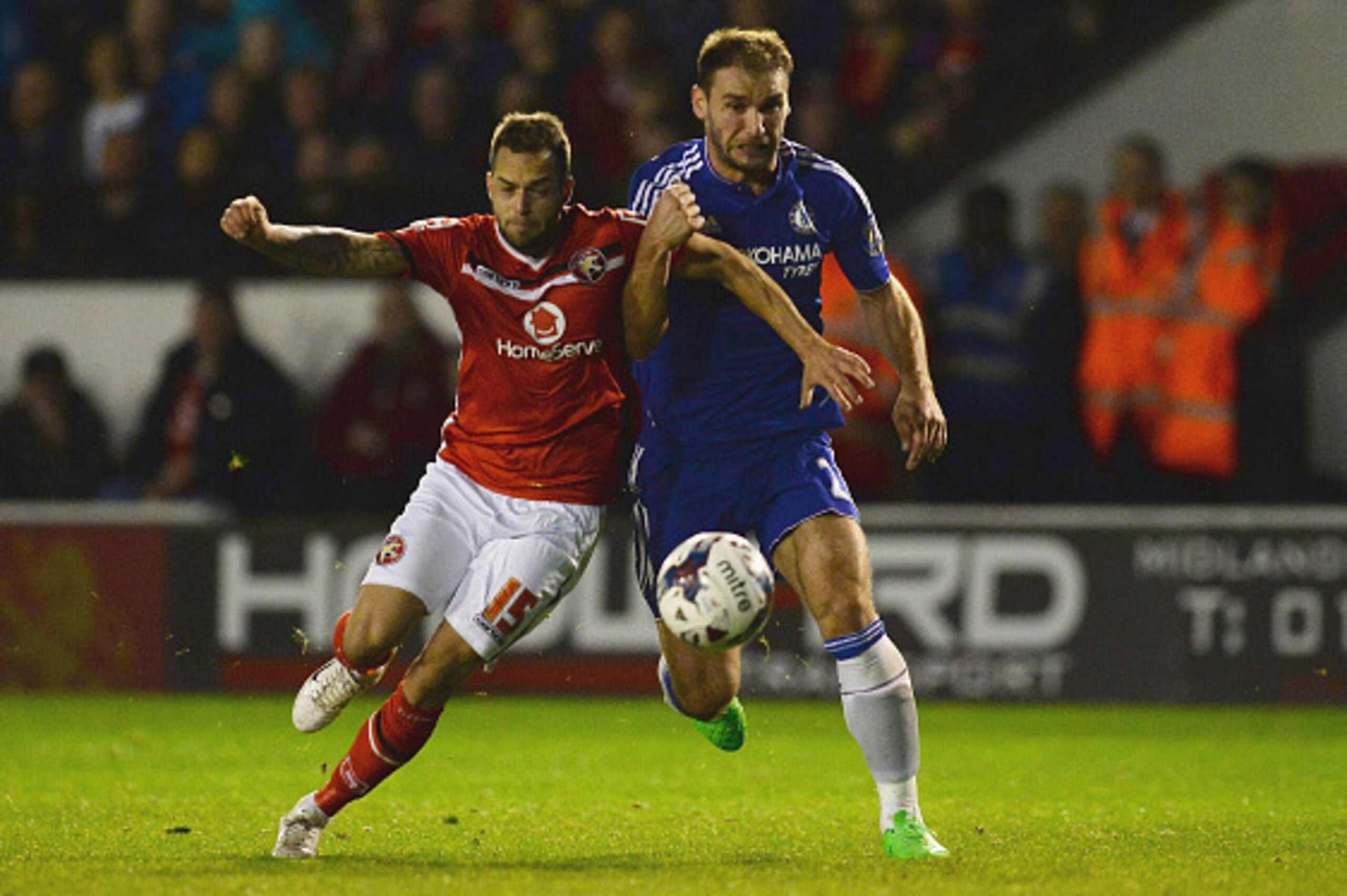 WALSALL, ENGLAND - SEPTEMBER 23:  Milan Lalkovic of Walsall and Branislav Ivanovic of Chelsea battle for the ball during the Capital One Cup third round match between Walsall and Chelsea at Banks's Stadium on September 23, 2015 in Walsall, England.  (Phot