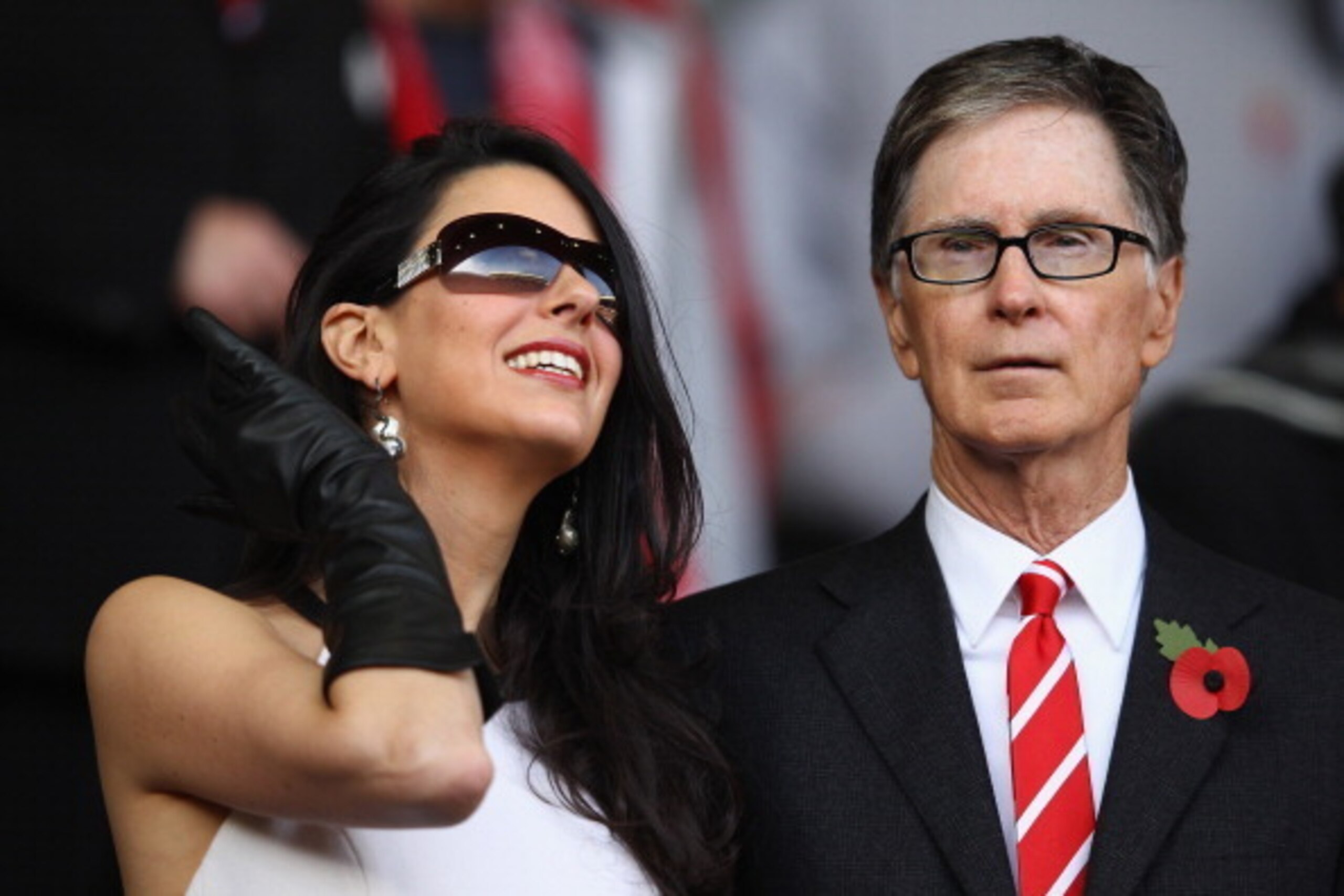 LIVERPOOL, ENGLAND - NOVEMBER 05: John W. Henry and his wife Linda Pizzuti look on before the match the Barclays Premier League match between Liverpool and Swansea City at Anfield on November 5, 2011 in Liverpool, England. (Photo by Clive Mason/Getty Im LIVERPOOL, ENGLAND - NOVEMBER 05: John W. Henry and his wife Linda Pizzuti look on before the match the Barclays Premier League match between Liverpool and Swansea City at Anfield on November 5, 2011 in Liverpool, England. (Photo by Clive Mason/Getty Im
