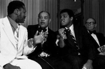 Joe Louis attempts to keep the peace.